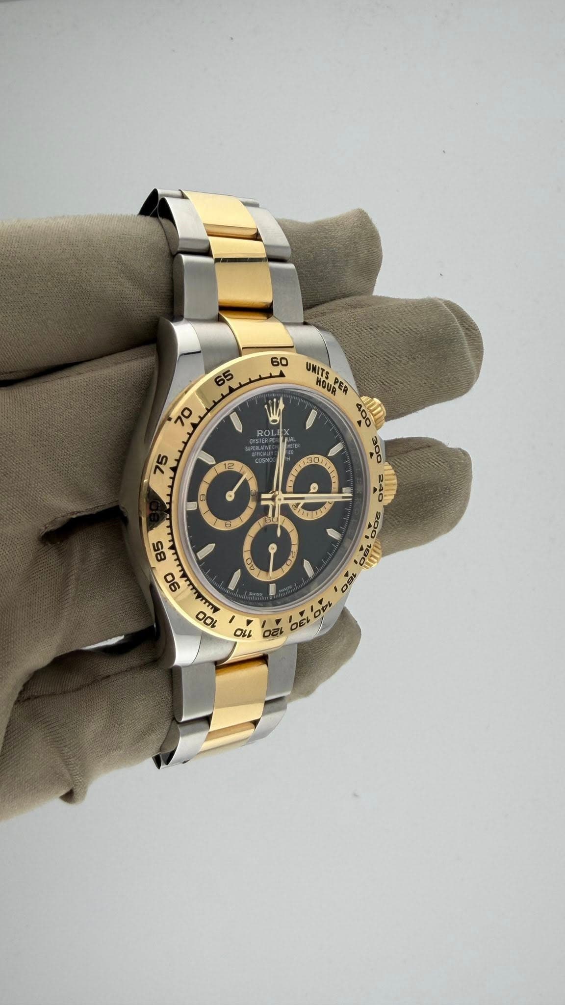 May be an image of wrist watch and text