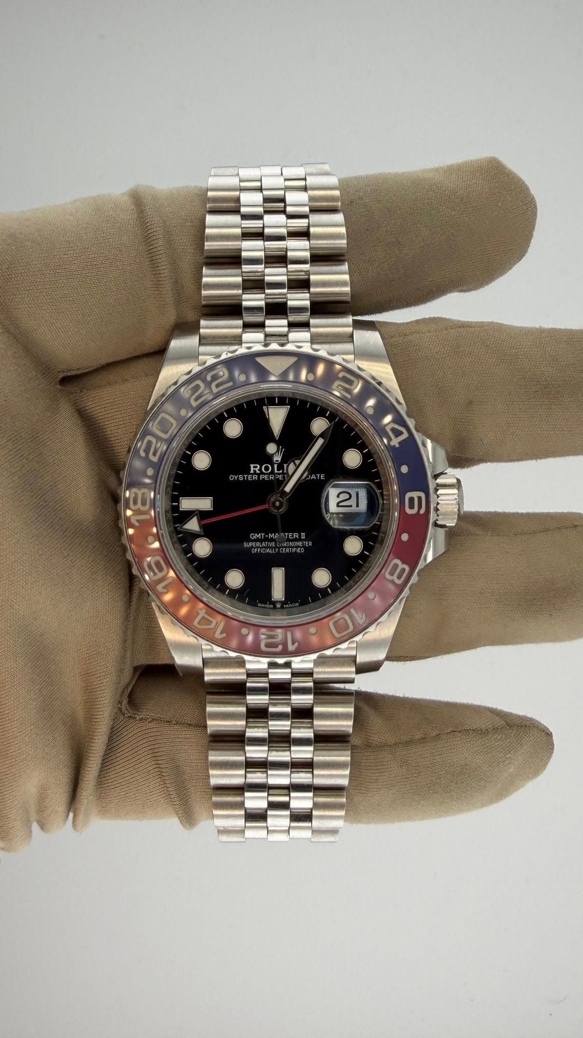 May be an image of wrist watch and text