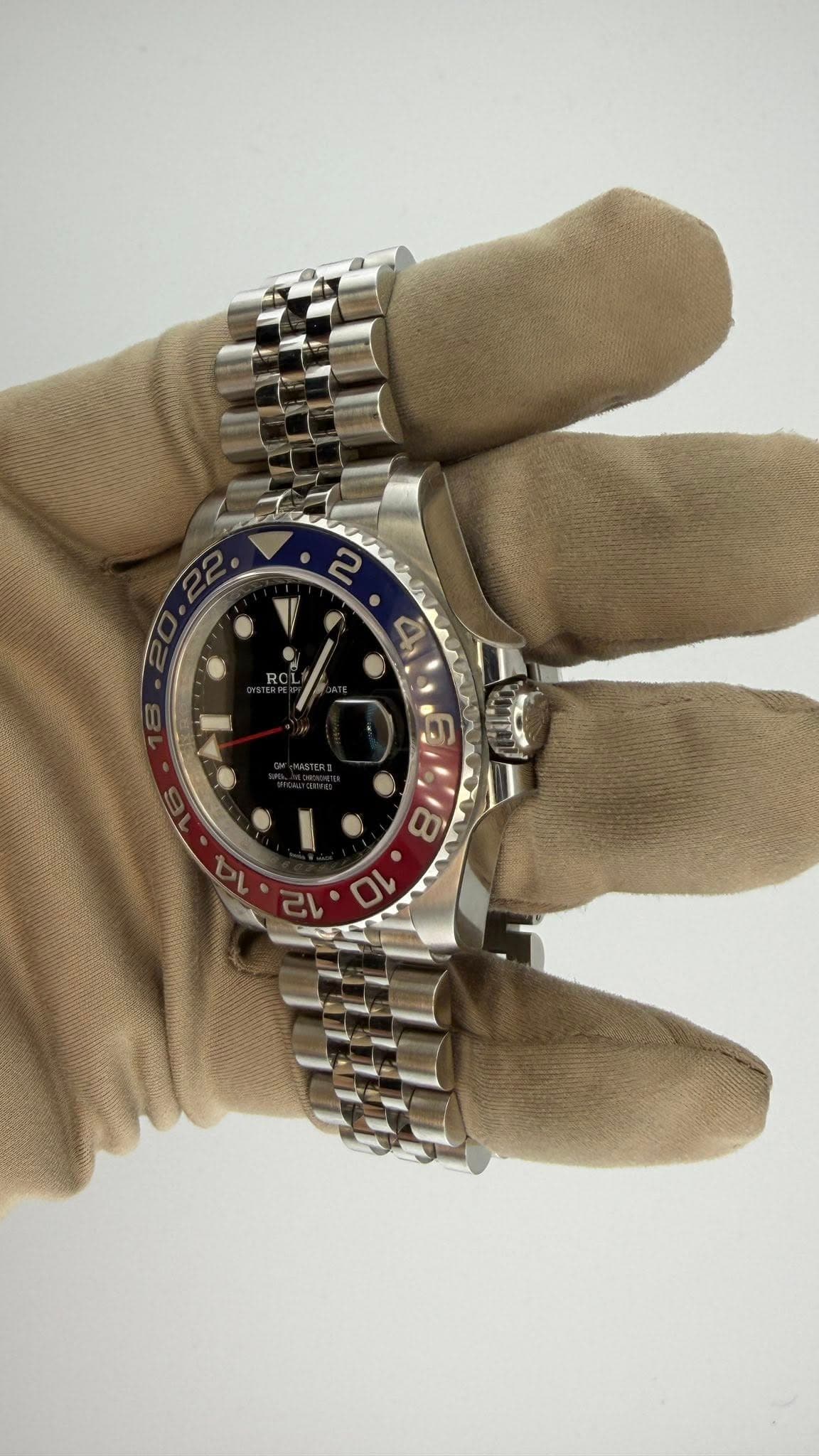 May be an image of wrist watch and text