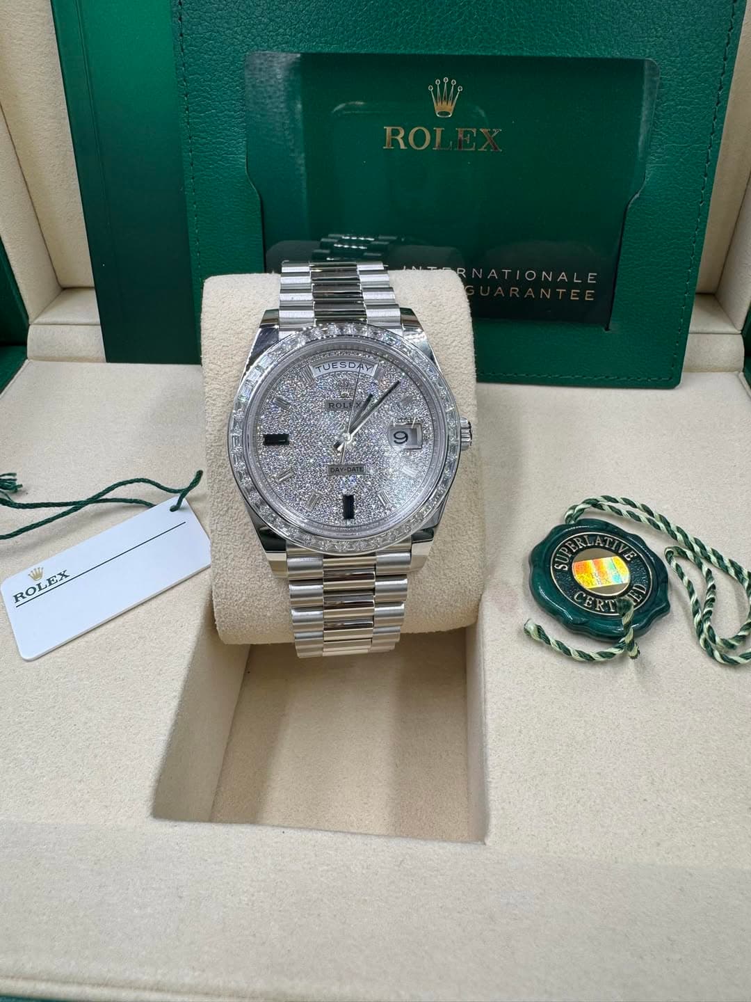 May be an image of wrist watch and text