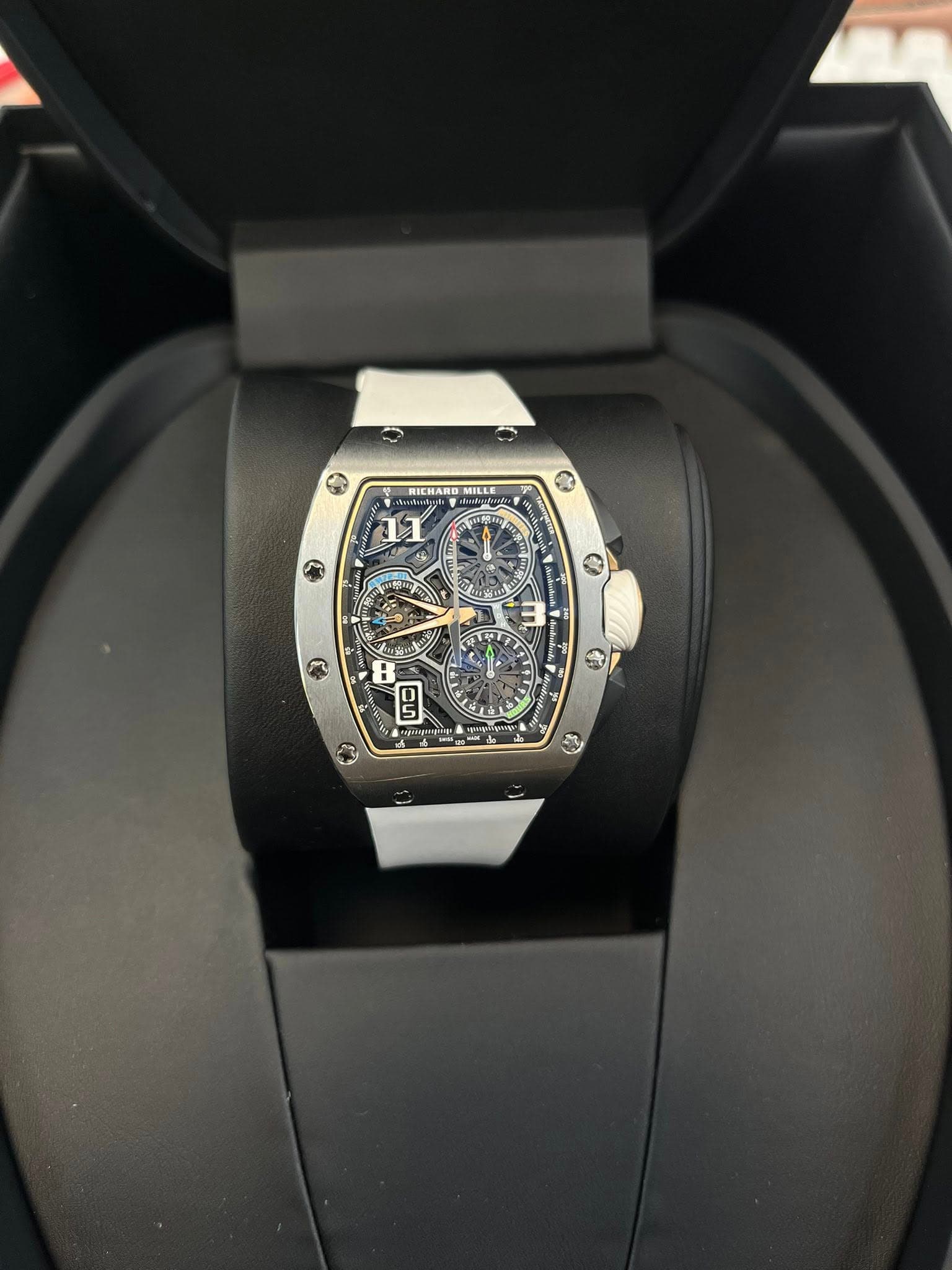 May be an image of wrist watch and text