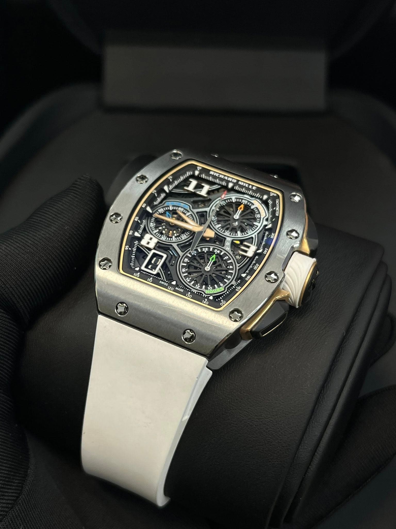 May be an image of wrist watch and text