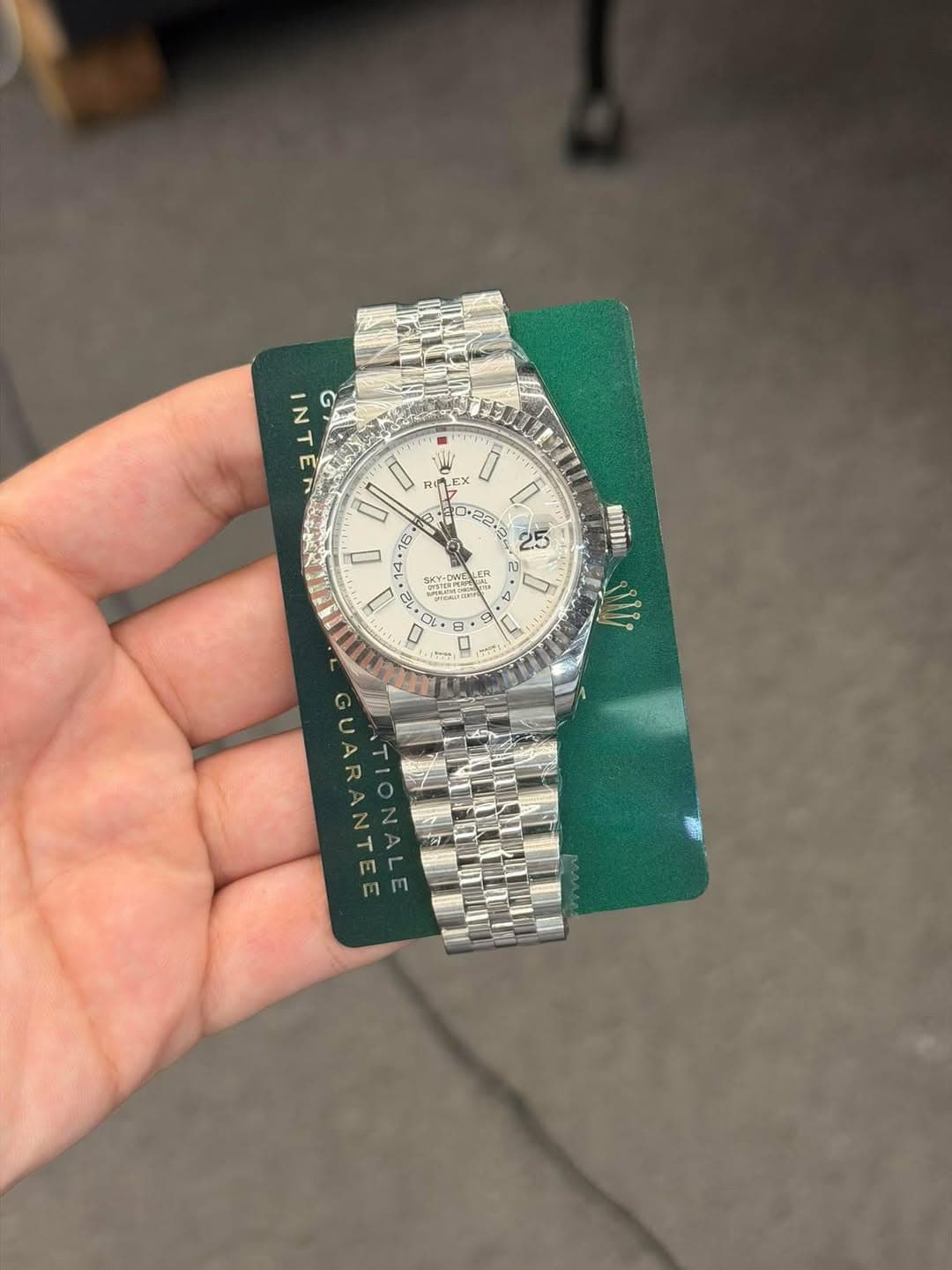 May be an image of wrist watch and text