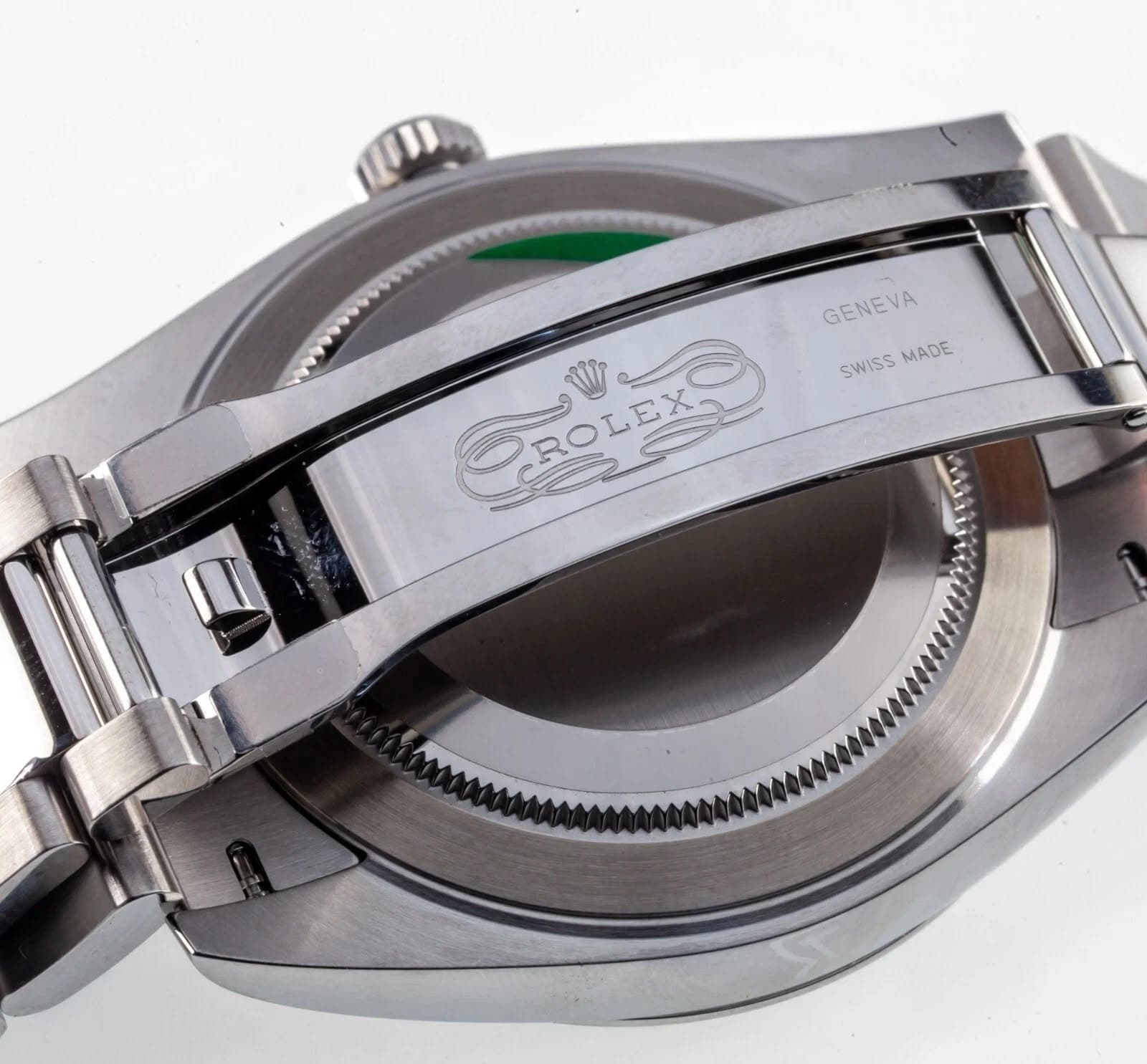 May be an image of wrist watch and text that says 'GENEVA CROLEXO OROLEXO e SWISS SWISSMADE MADE'