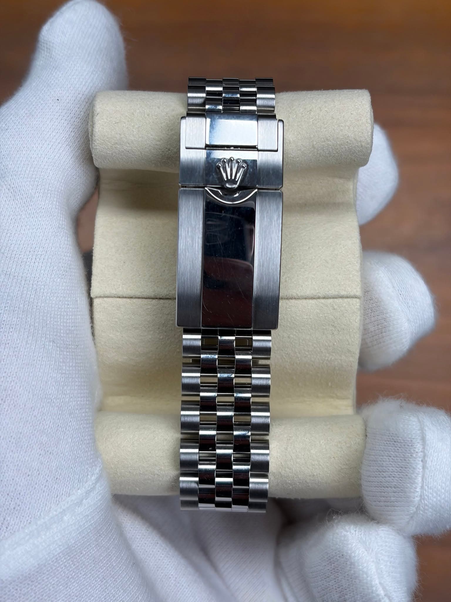 May be an image of wrist watch and text