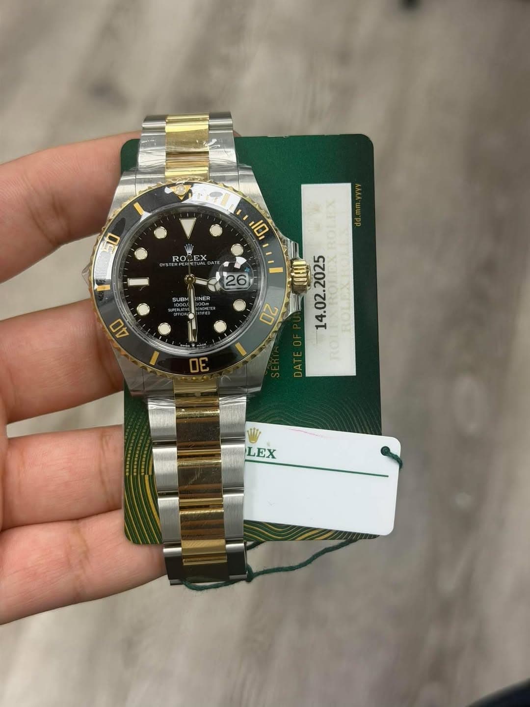 May be an image of wrist watch and text that says '10 ROLEX ROLEX ROS REX 5 RO C UAA pa DAT 1C 26 UN . ROT SUBN NER 0O- 40 30 DA LEX'