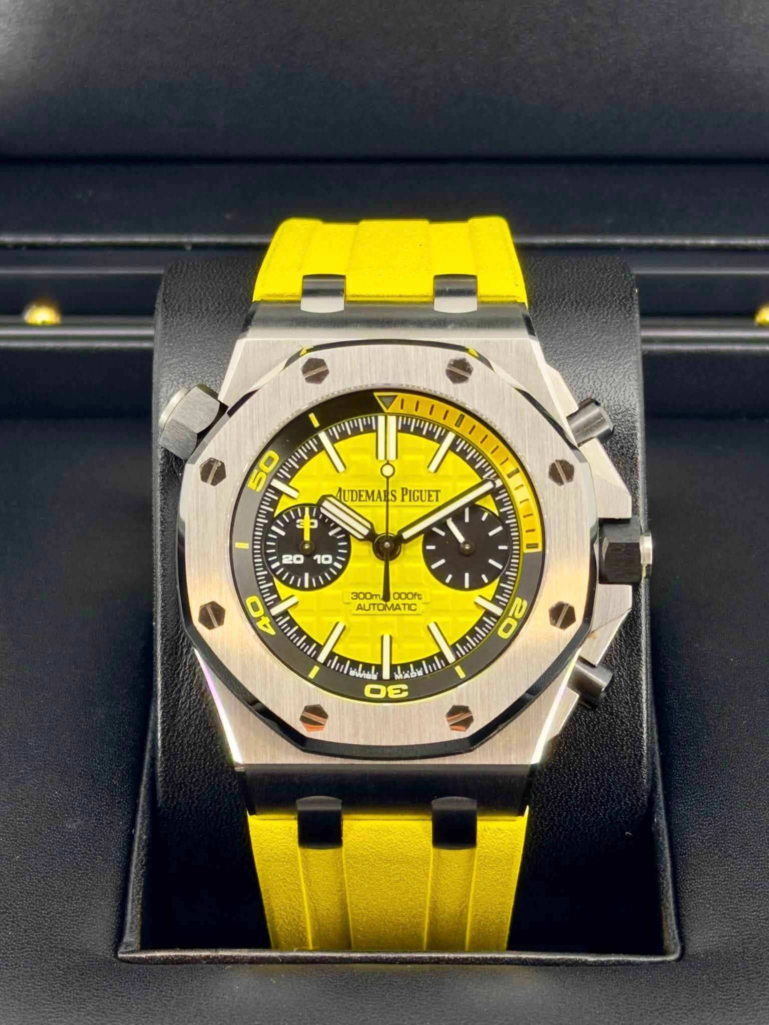 May be an image of wrist watch and text that says 'מייןייוייןי מוייויוין 50 መጣጣላ ሞጣ יויין W 1 AUDEMARSPIGUET UDEMARS PIGUET T DOOft AUTOMATIC 40 יוייוייויי ሞጥ ilabule badwhin DE…