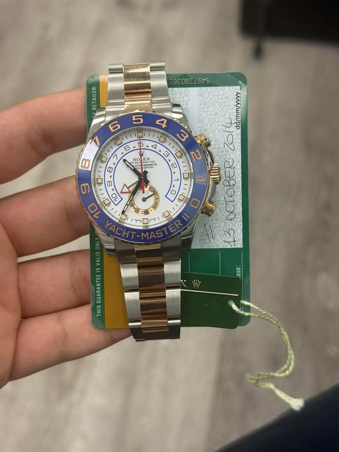 May be an image of wrist watch and text