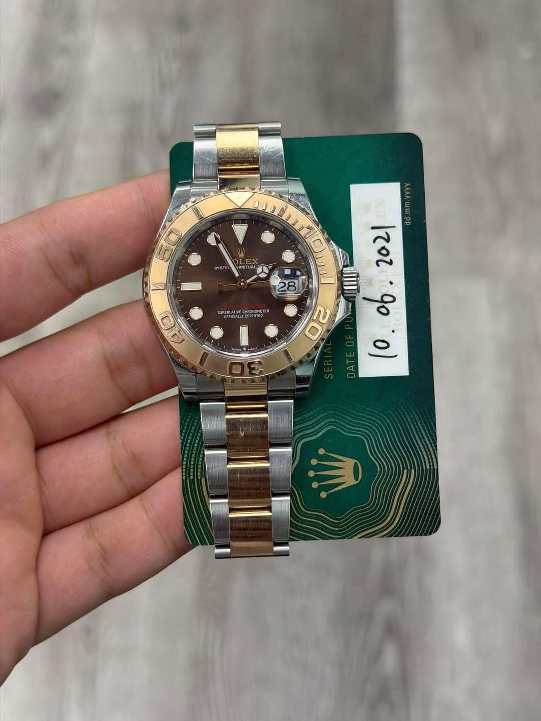 May be an image of wrist watch and text