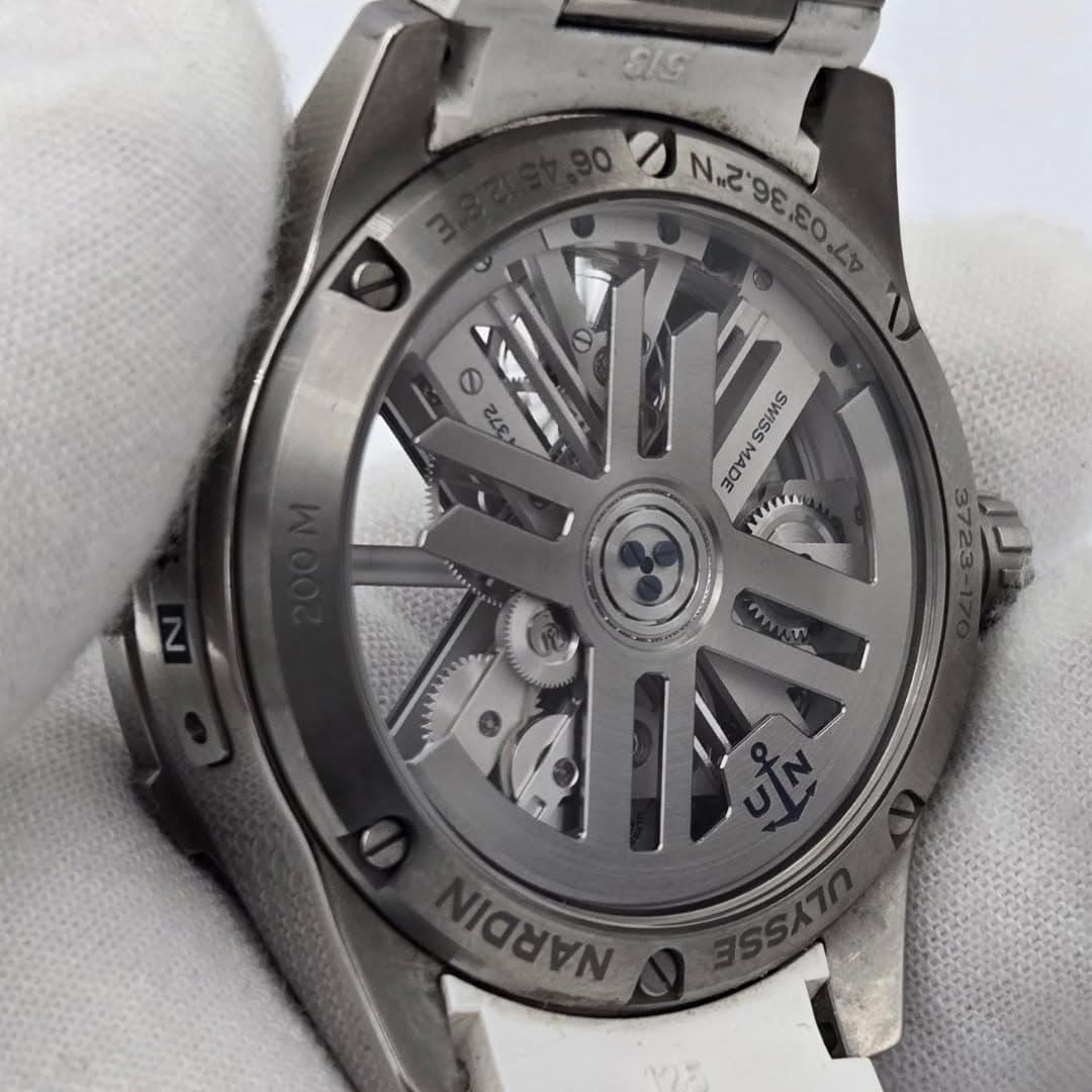 May be an image of wrist watch and text