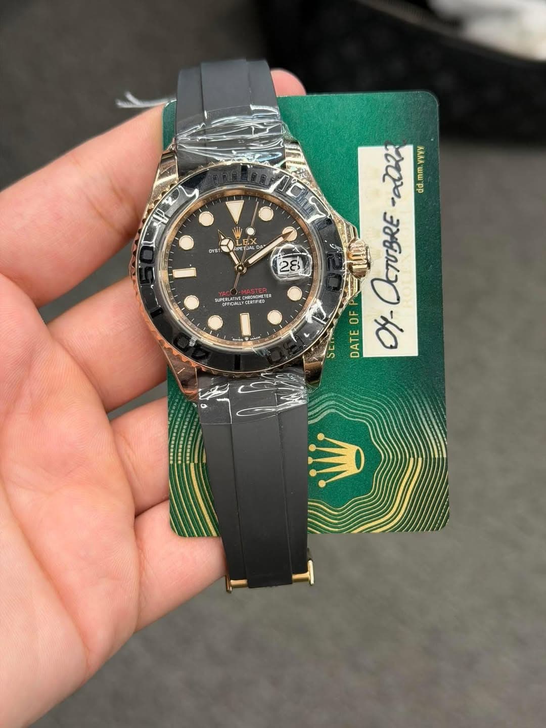 May be an image of wrist watch and text