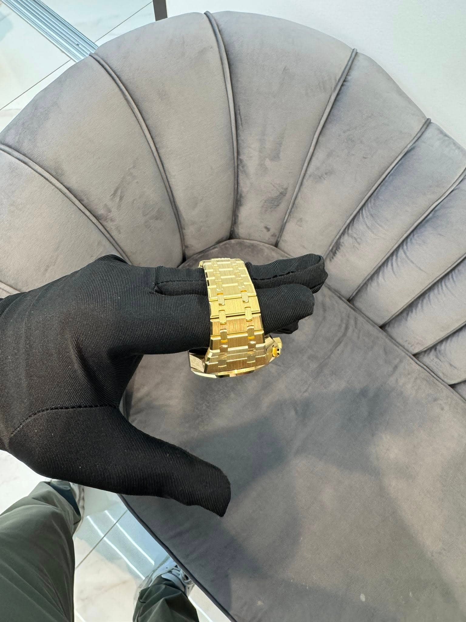 May be an image of leather and wrist watch