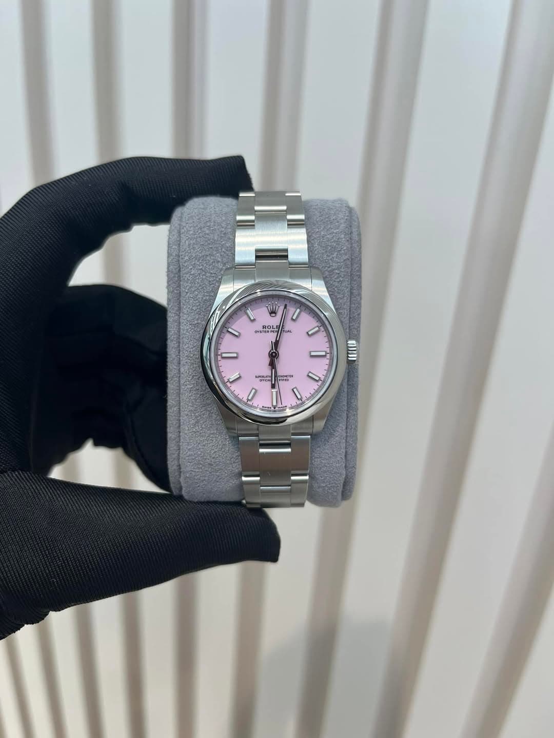 May be an image of wrist watch and text