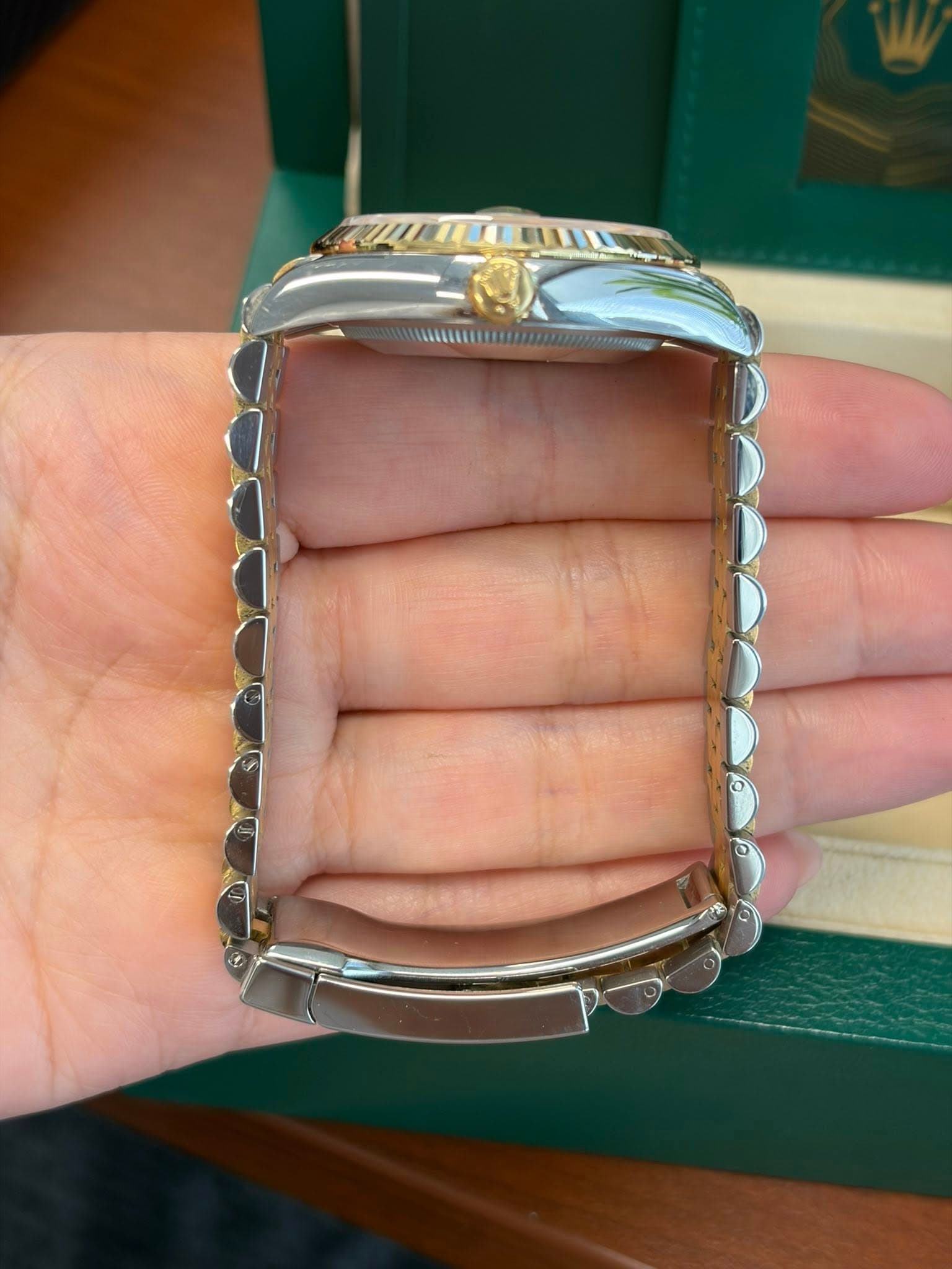 May be an image of wrist watch