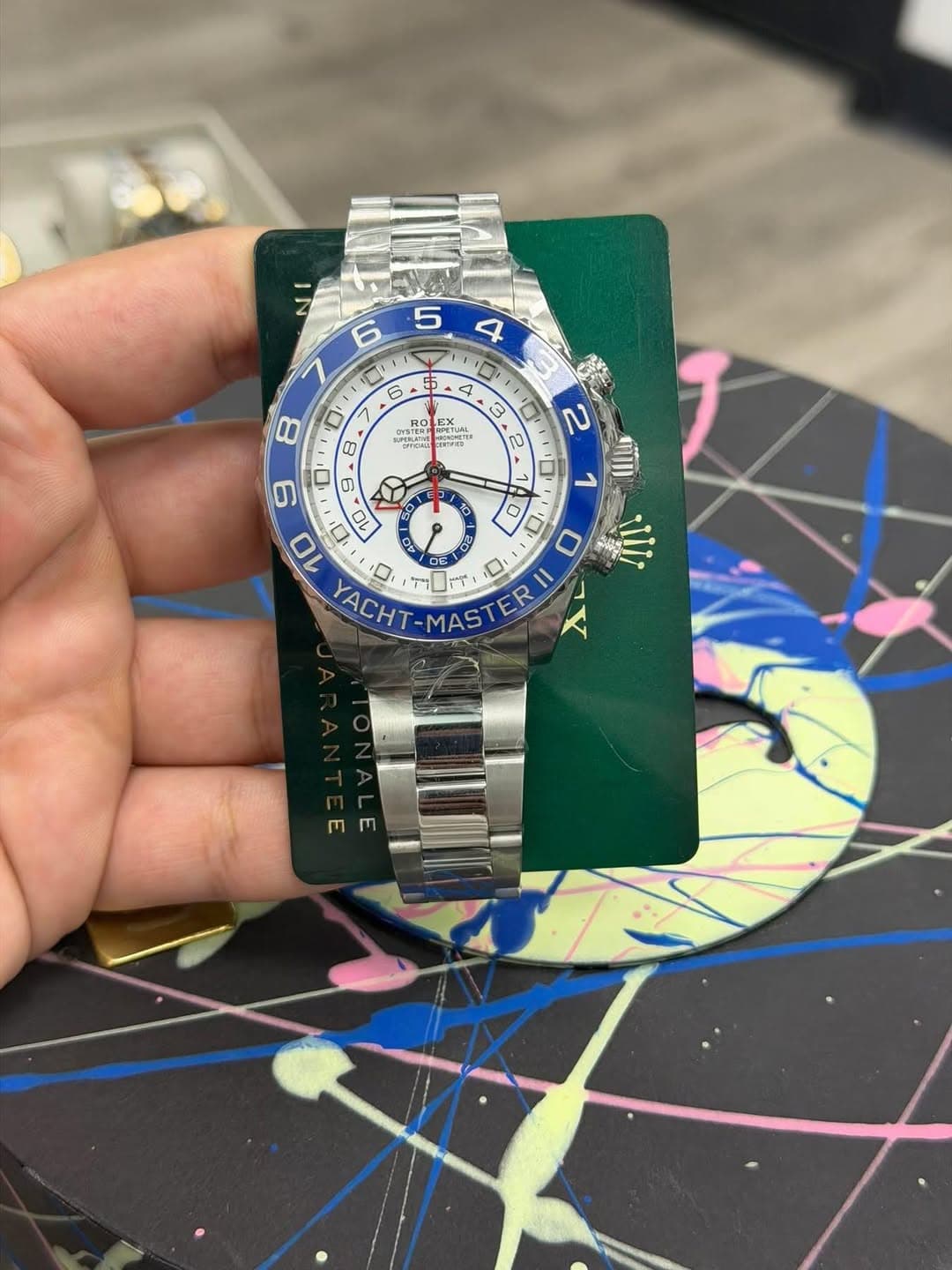 May be an image of wrist watch and text
