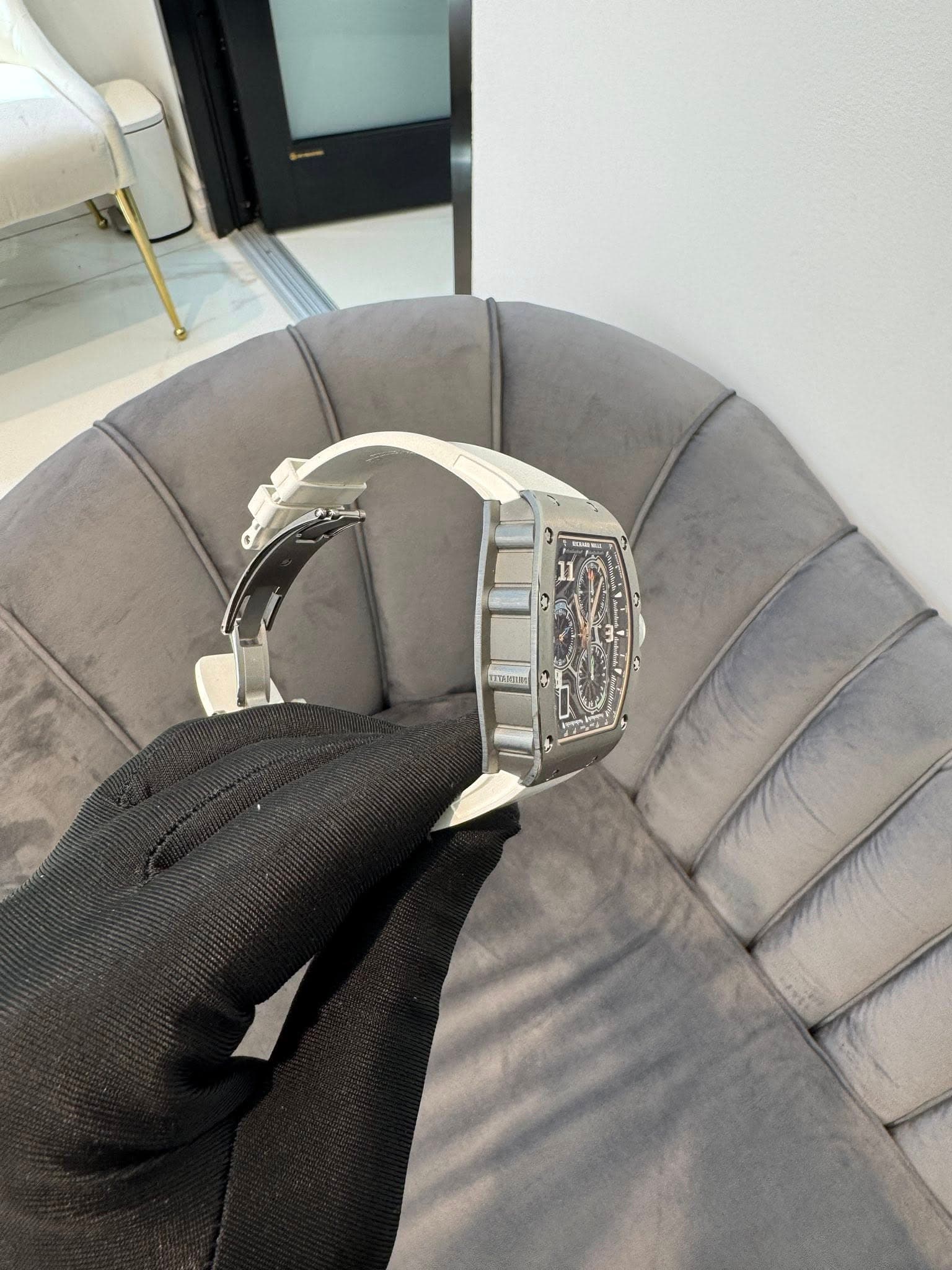May be an image of wrist watch and leather