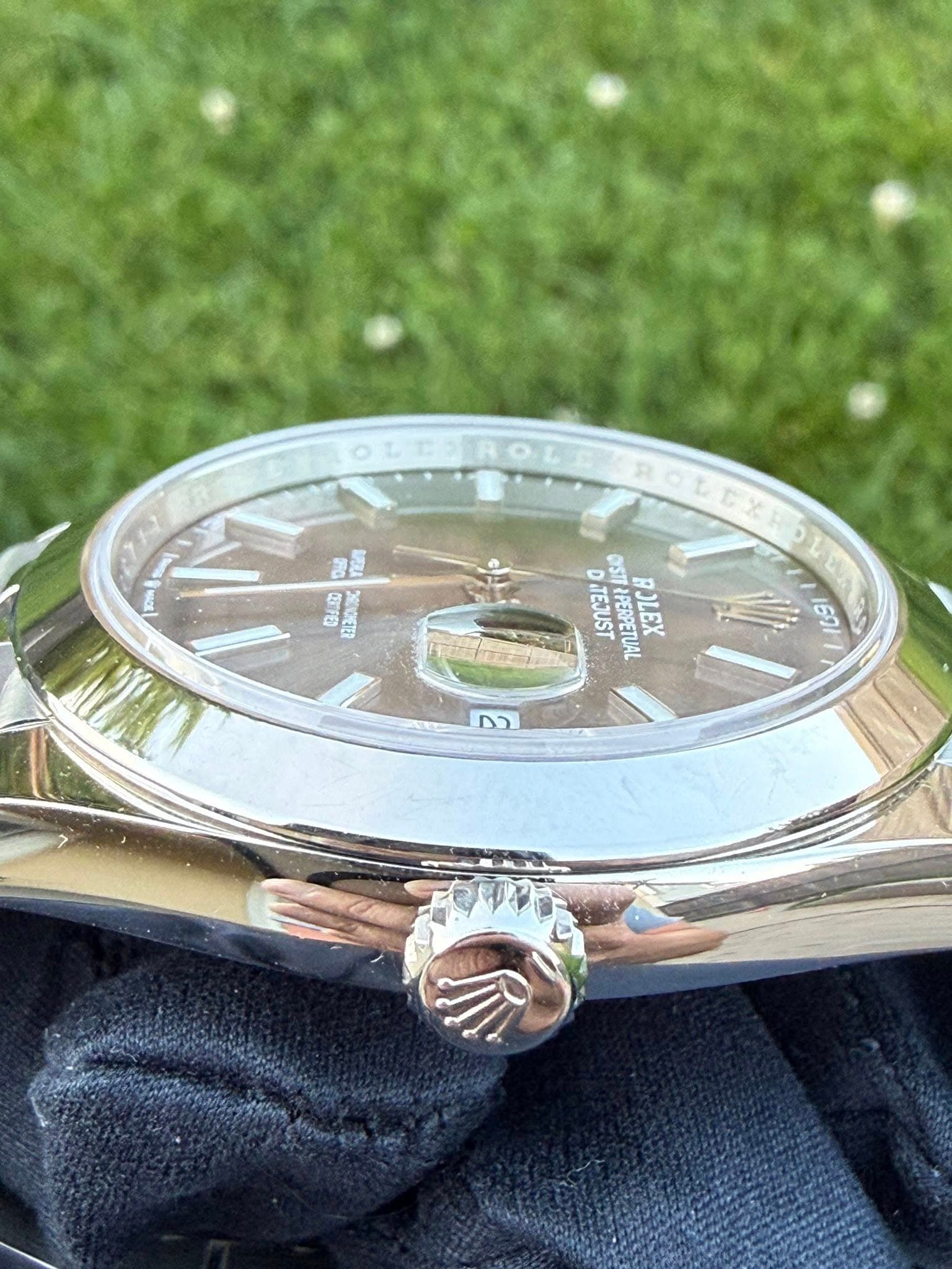 May be an image of wrist watch and text that says 'IROL YEA BLD IRDTS Hめ DITEJUST D CA 0511 OST TEJUST PERPETUAL BOLESTUAL BJLEX 601 בם'