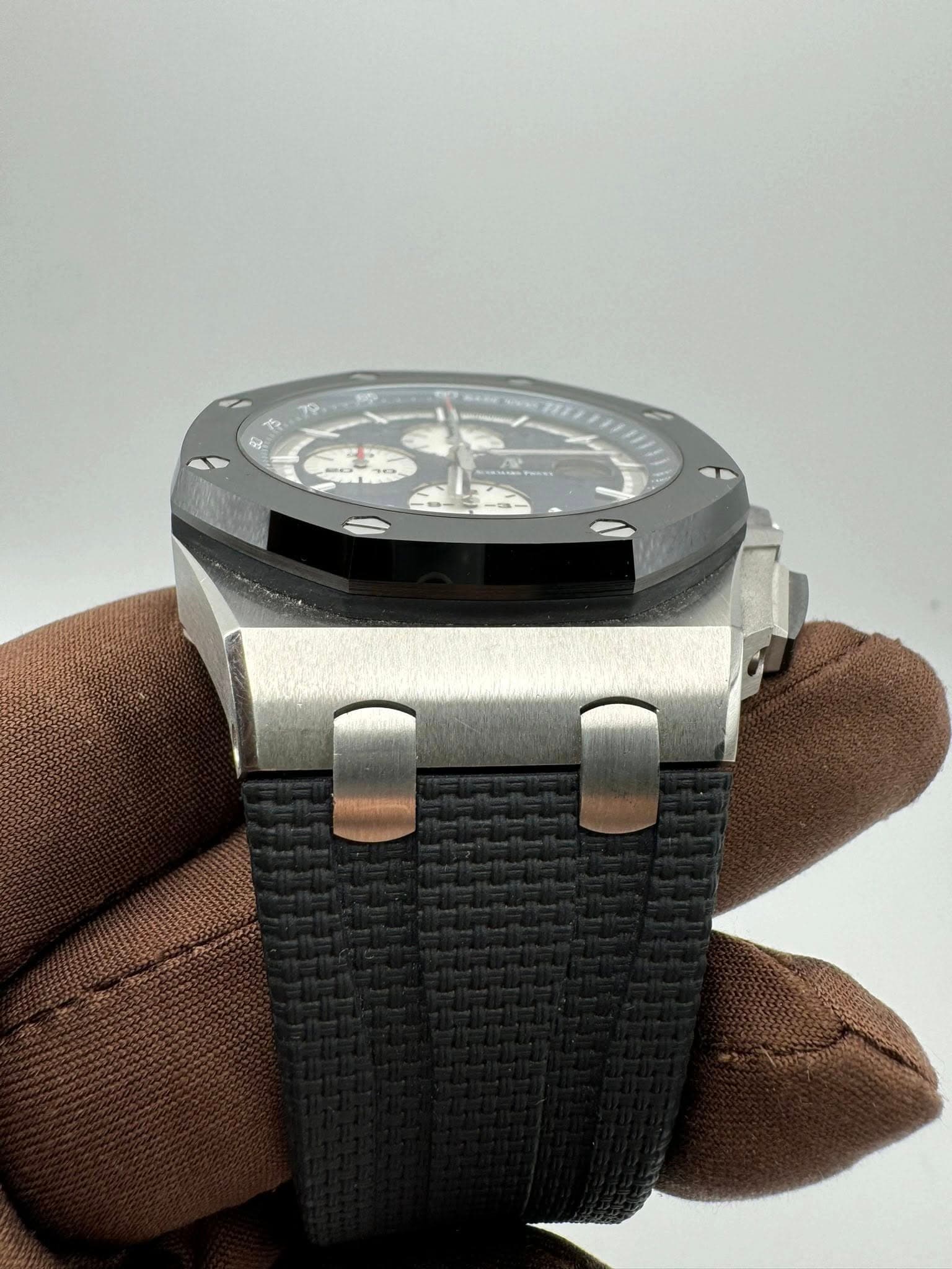May be an image of wrist watch and text