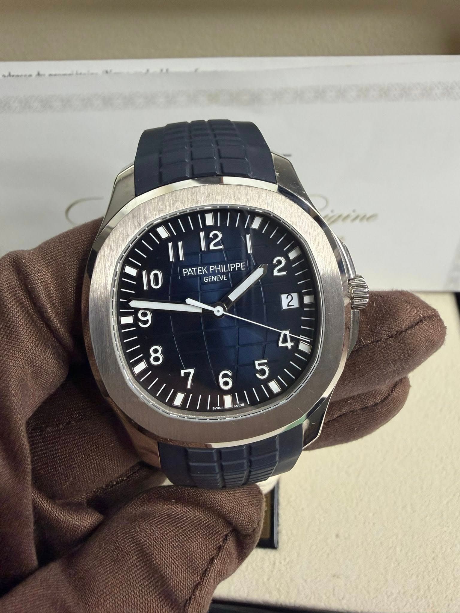 May be an image of wrist watch and text