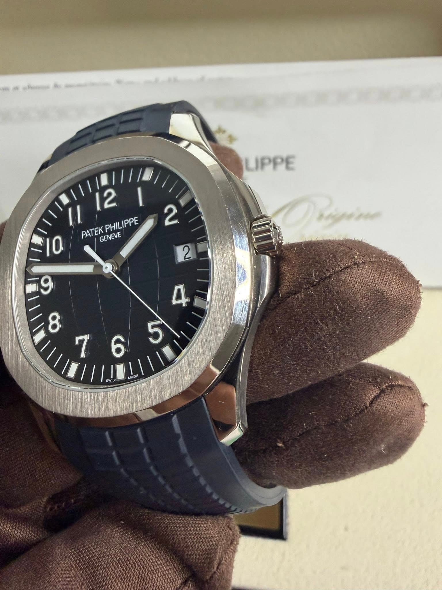 May be an image of wrist watch and text