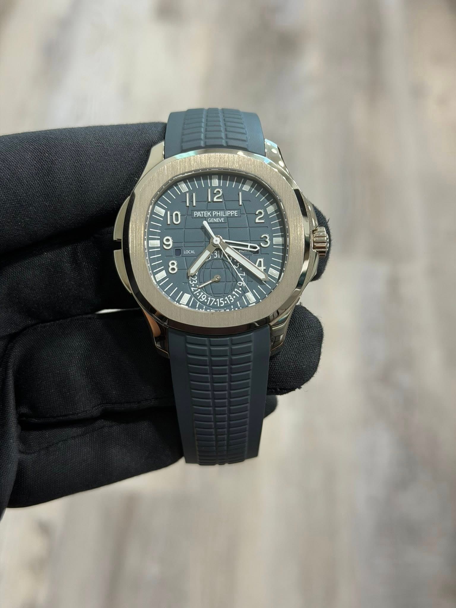 May be an image of wrist watch and text that says '1art1 1 12 I O PATEK PATEKPHILIPPE PHILIPPE NIVE 9 LDCAL 8 31 2 3 R a L- '