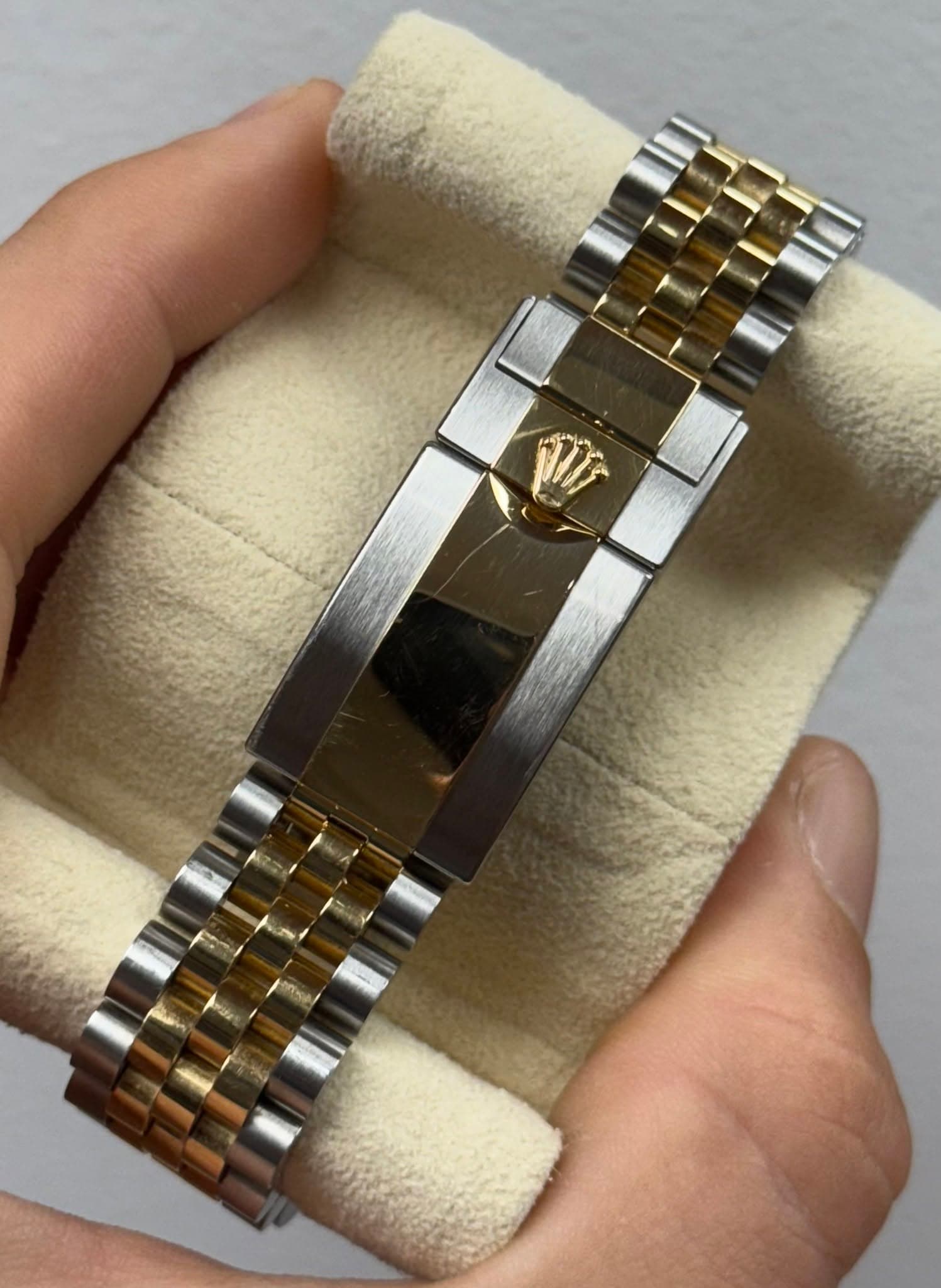 May be an image of wrist watch