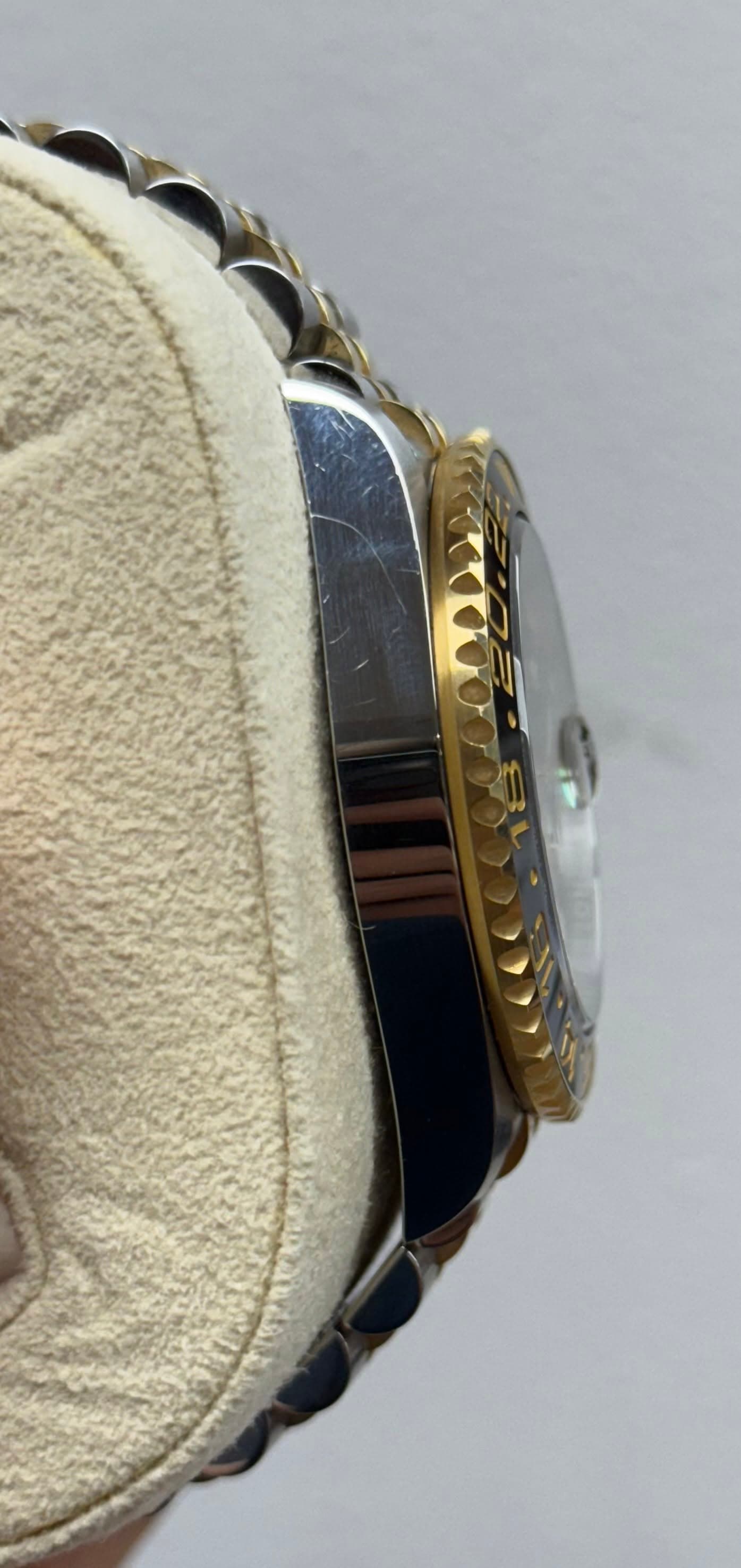 May be an image of wrist watch and leather
