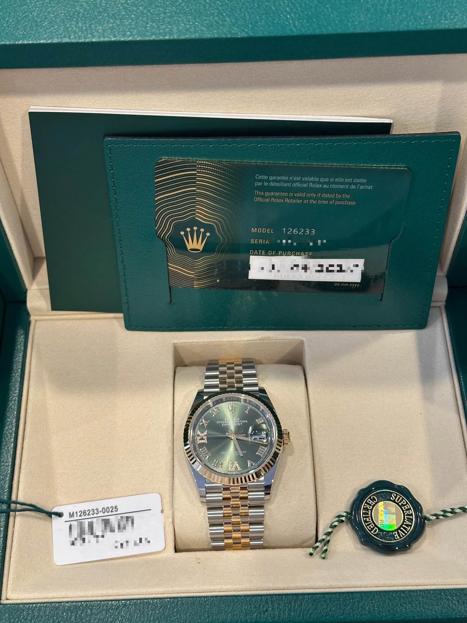 May be an image of wrist watch and text that says 'MODEL 126233 キコニュュー ብቶ コニュ လကည် ኢዮ A ЖΙ L E 0 VI 4 成 D ต้ามิง M126233-0025 ወቢራሪ M12623 0025 11で வமி ED SUPERLA SIIT SUPER SUP…