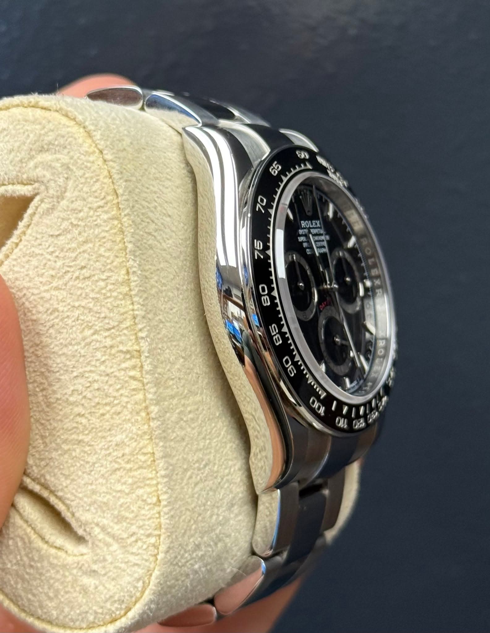 May be an image of wrist watch and text