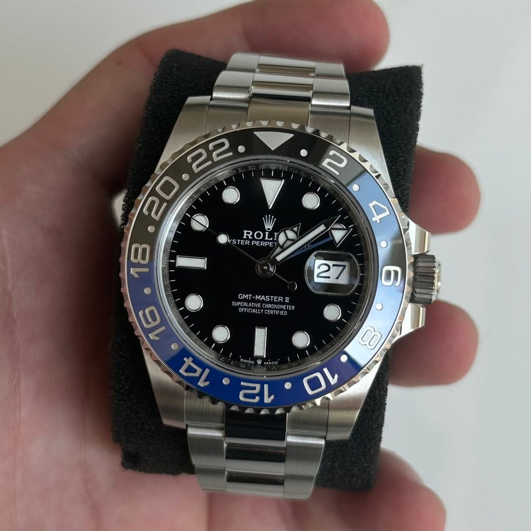 May be an image of wrist watch and text