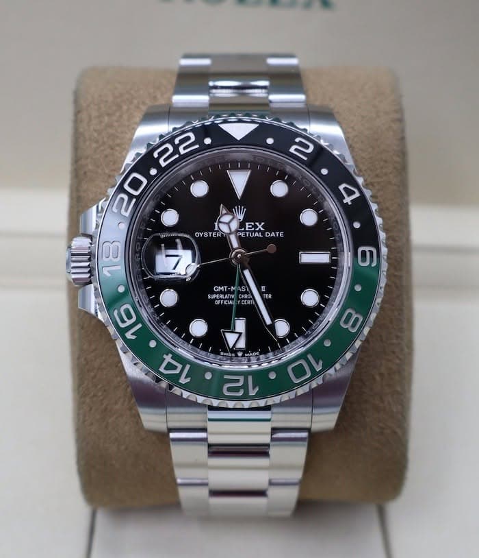 May be an image of wrist watch and text
