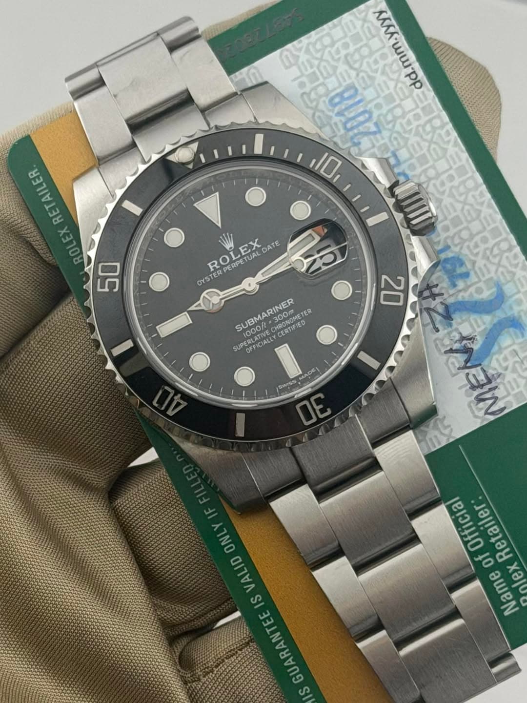May be an image of wrist watch and text that says 'aжoиω! KAЛЛ.wwpp p 10 ETAILER ROLEX 50 ROI ROLEX PE PERPETUAL TUAL EX DATE Hp OYSTER ER SUBMARINER 300m.. CESTIFIED TIFIED 300m…