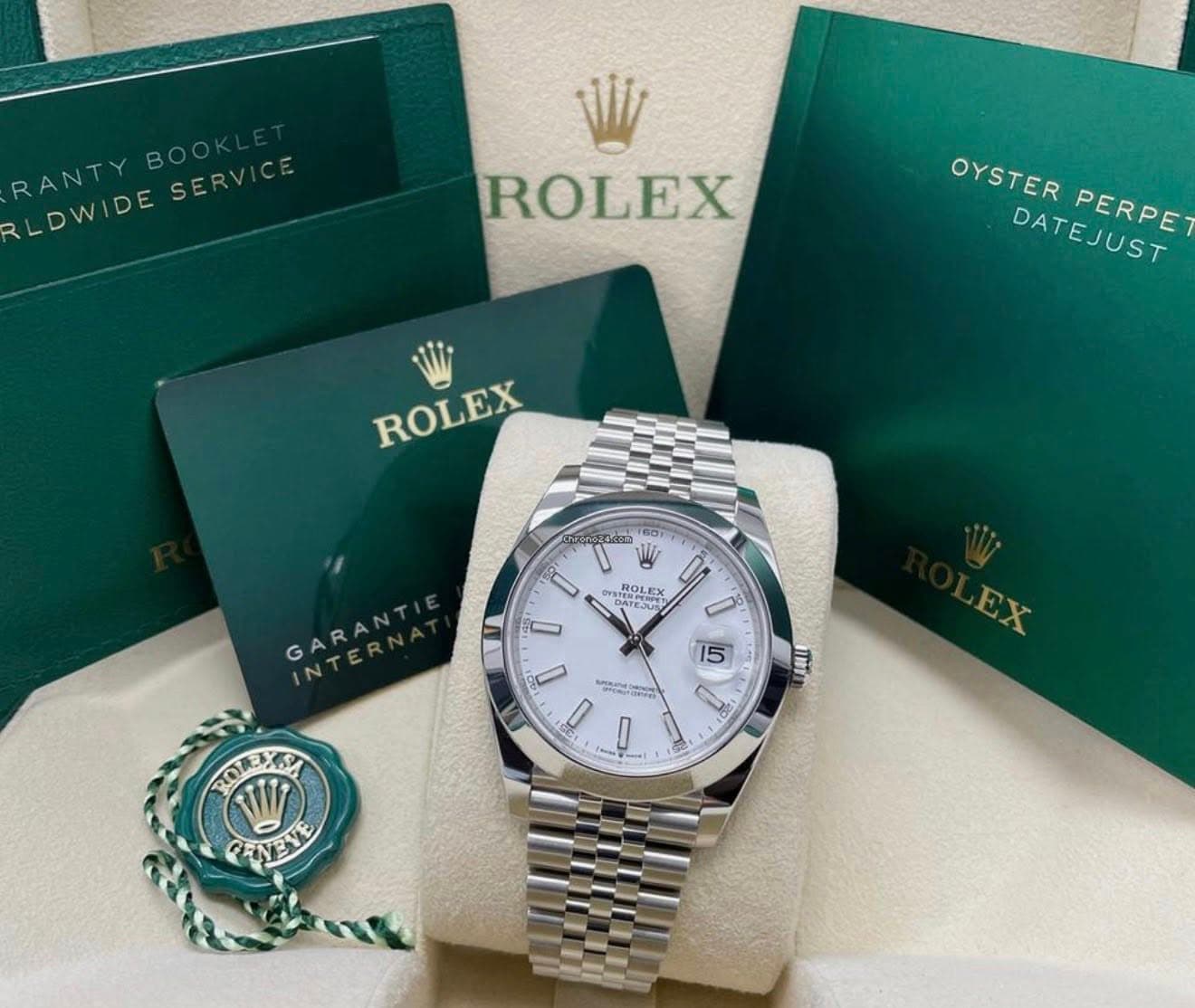 May be an image of wrist watch and text that says 'LDWIDESER RANTY RLDWIDE LOWIDESERVICE SERVICE SERV ROLEX OYSTER DATEJUST DATEJUST PERPE ROLEX 60 ROLEX 注康内究功 AE ATE-JUS กิก…