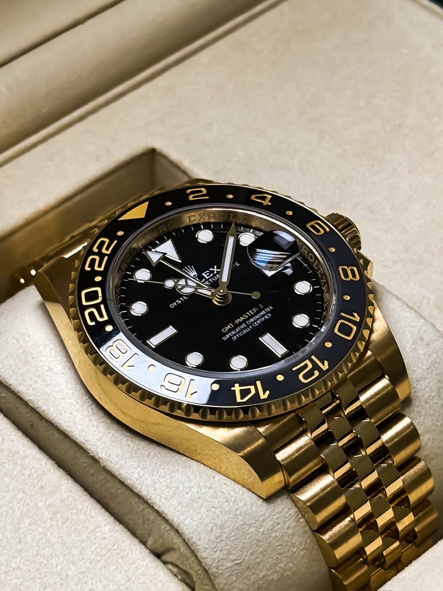 May be an image of wrist watch and text