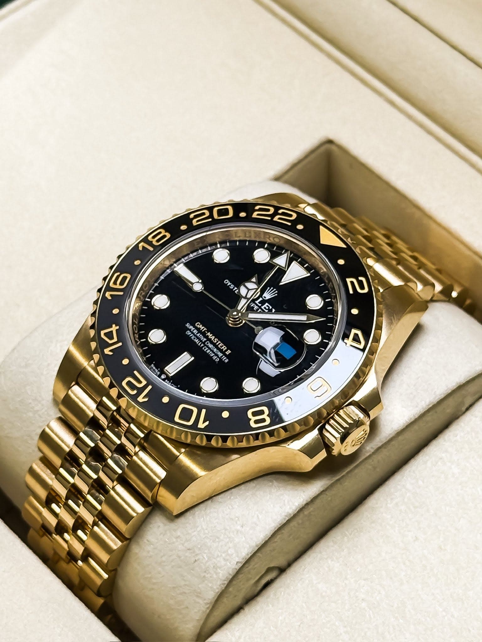 May be an image of wrist watch and text