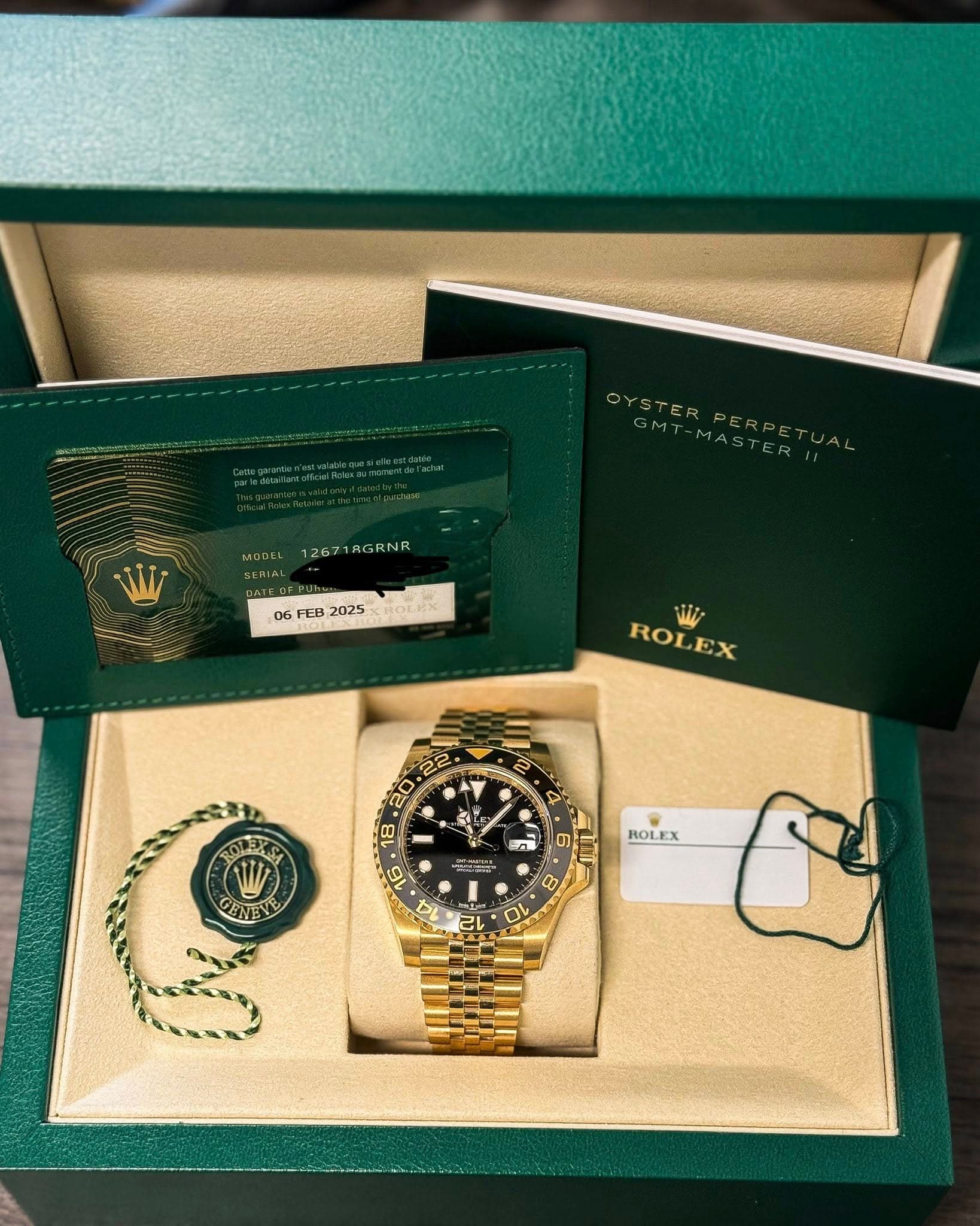 May be an image of wrist watch and text that says 'MODEL 12671AGRNR 1267 06 FEB 2025 KROLRX ROL ROLEX EX 2 4 ណ ኑ EL S L GENEY ROLEX 8 F'