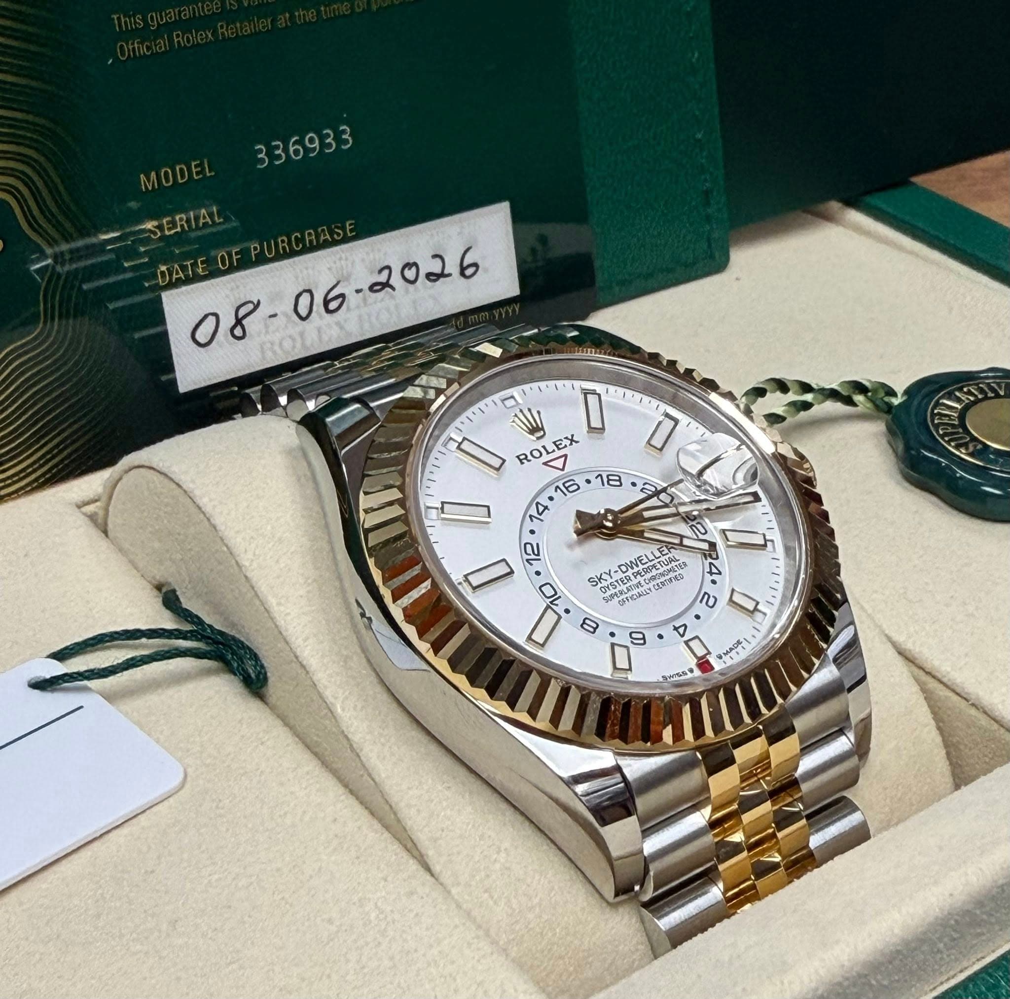 May be an image of wrist watch and text