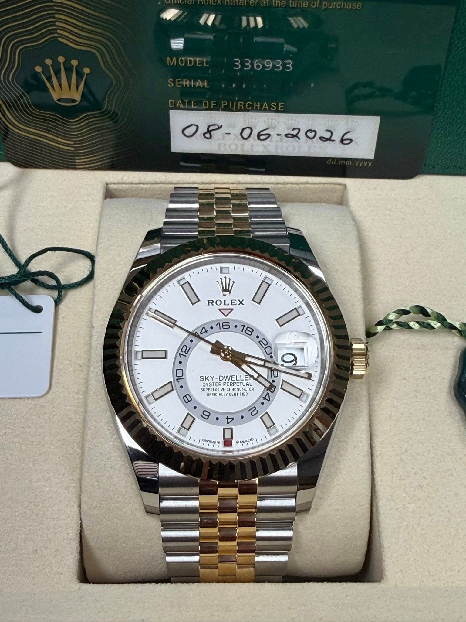 May be an image of wrist watch and text