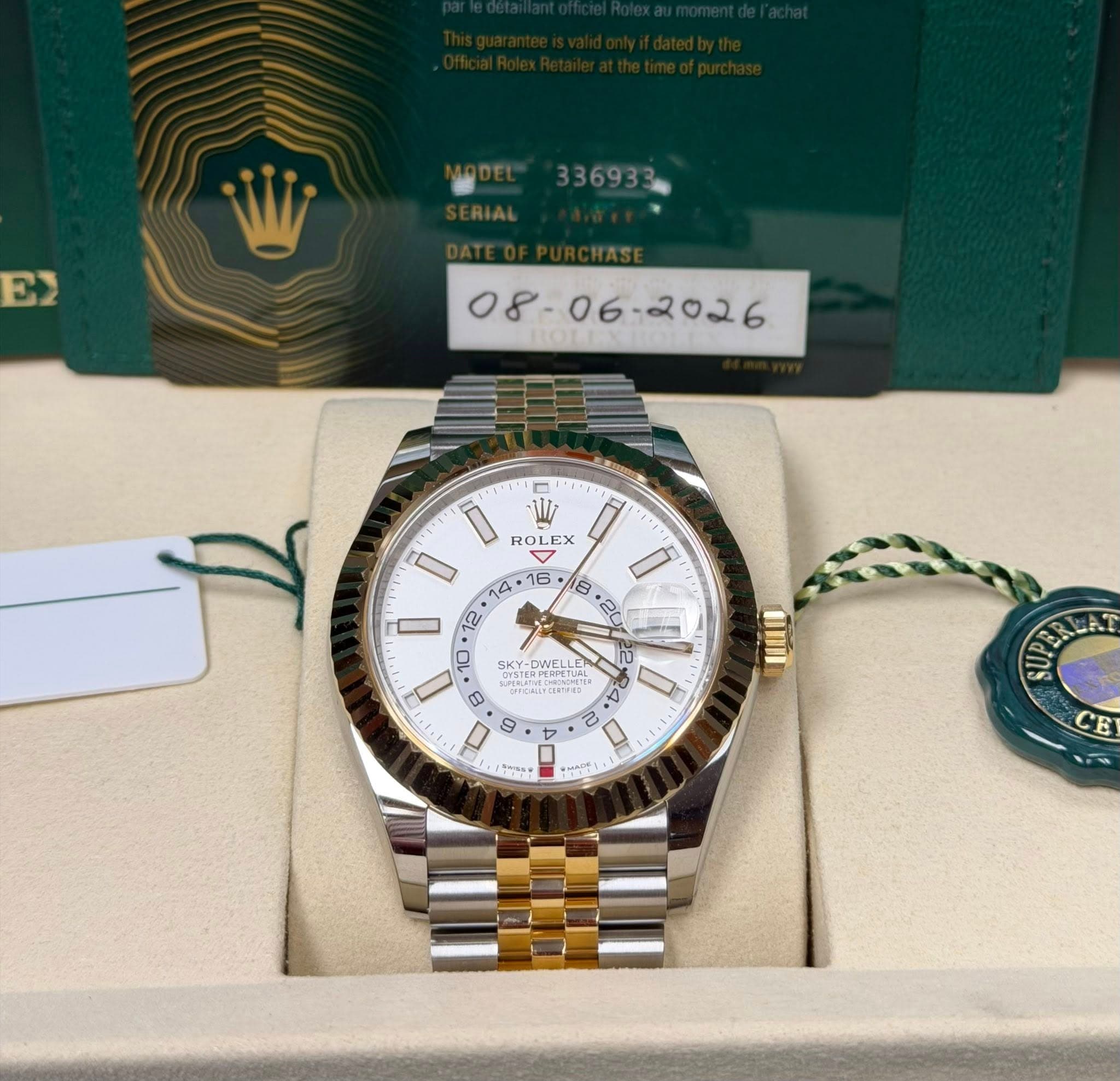 May be an image of wrist watch and text