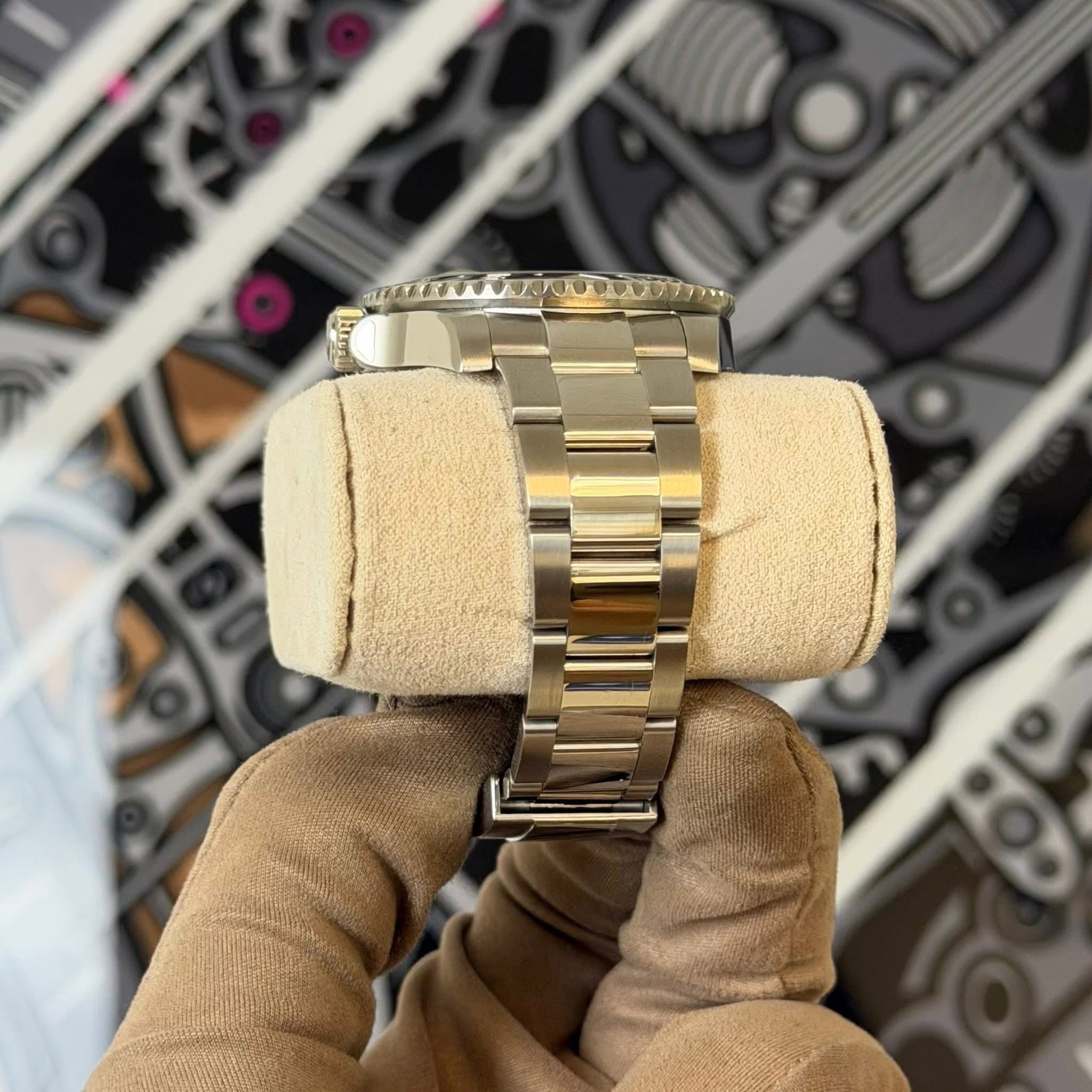 May be an image of wrist watch and text