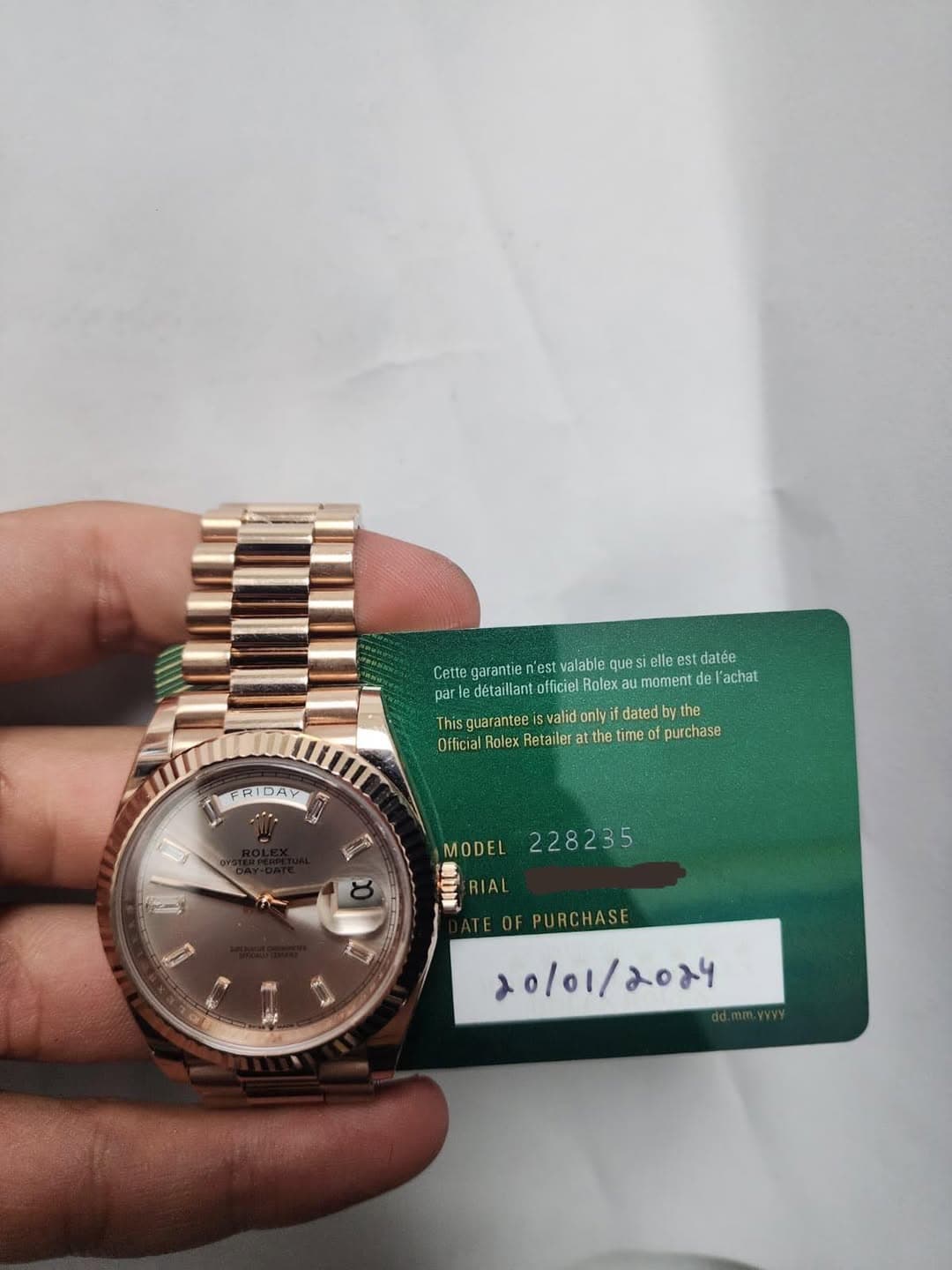 May be an image of wrist watch and text that says 'elle elleest est datée Cettegarantie Cette n'est valable ues moment de el 'achat par parledetaillant officiel Rolex Thisguarantee…
