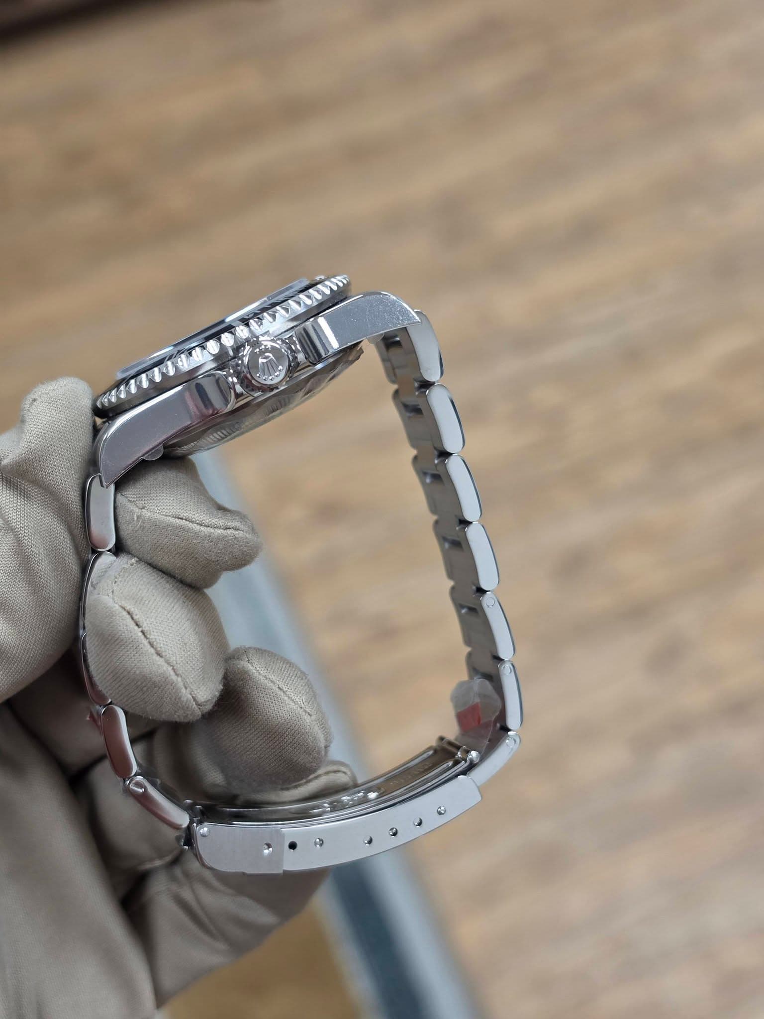 May be an image of wrist watch and text