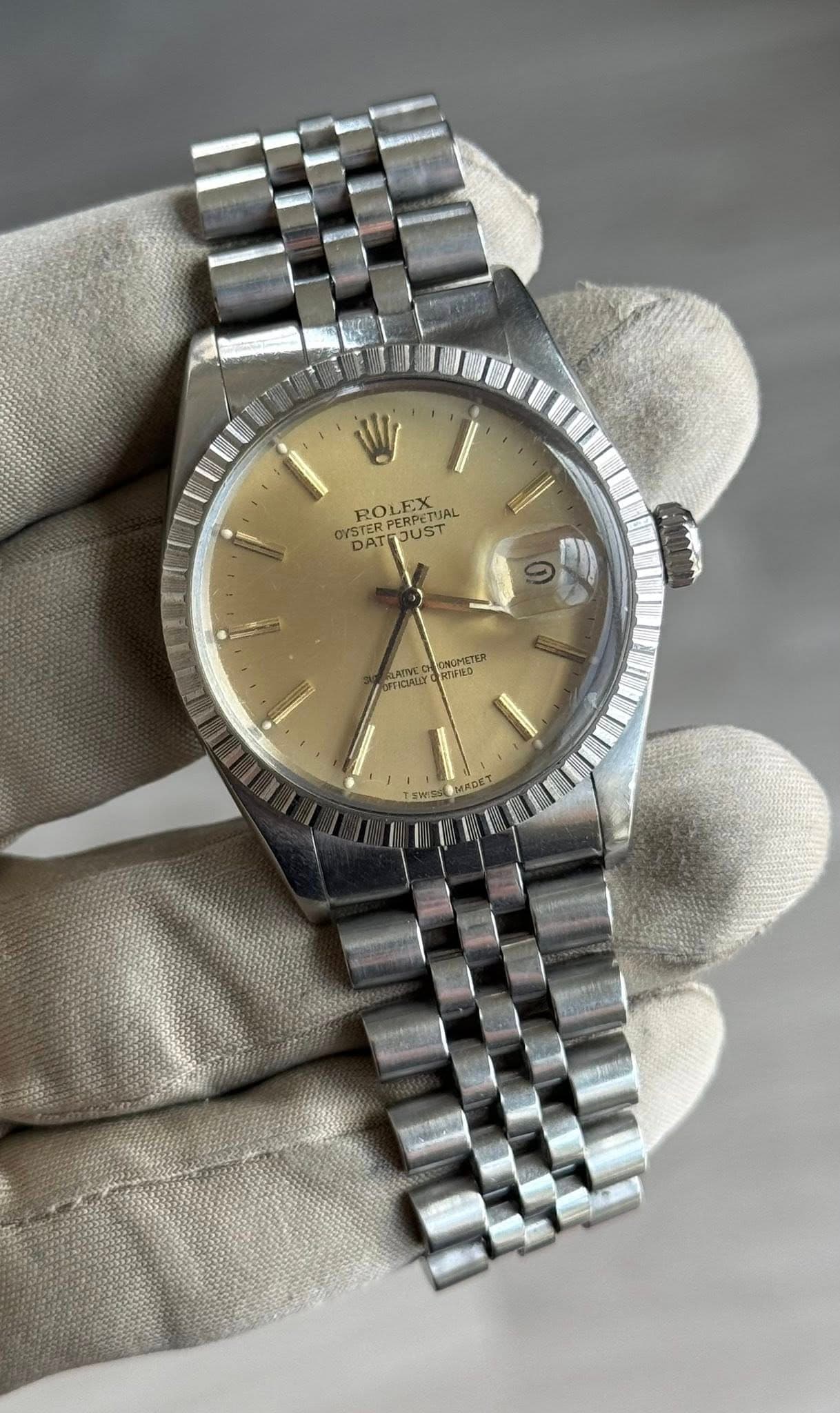 May be an image of wrist watch and text