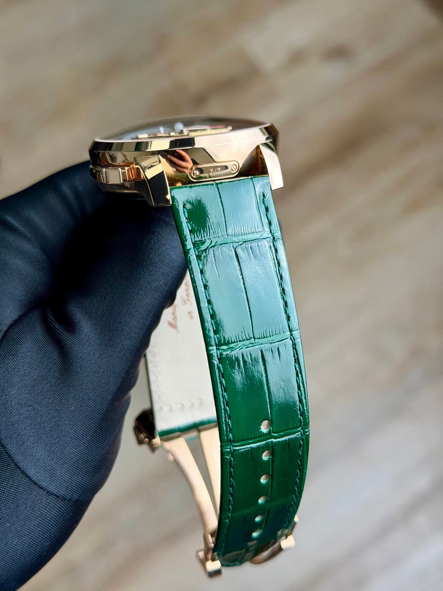 May be an image of wrist watch and text