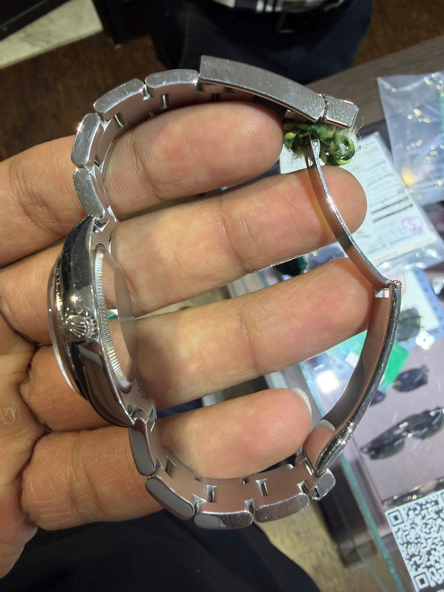 May be an image of wrist watch