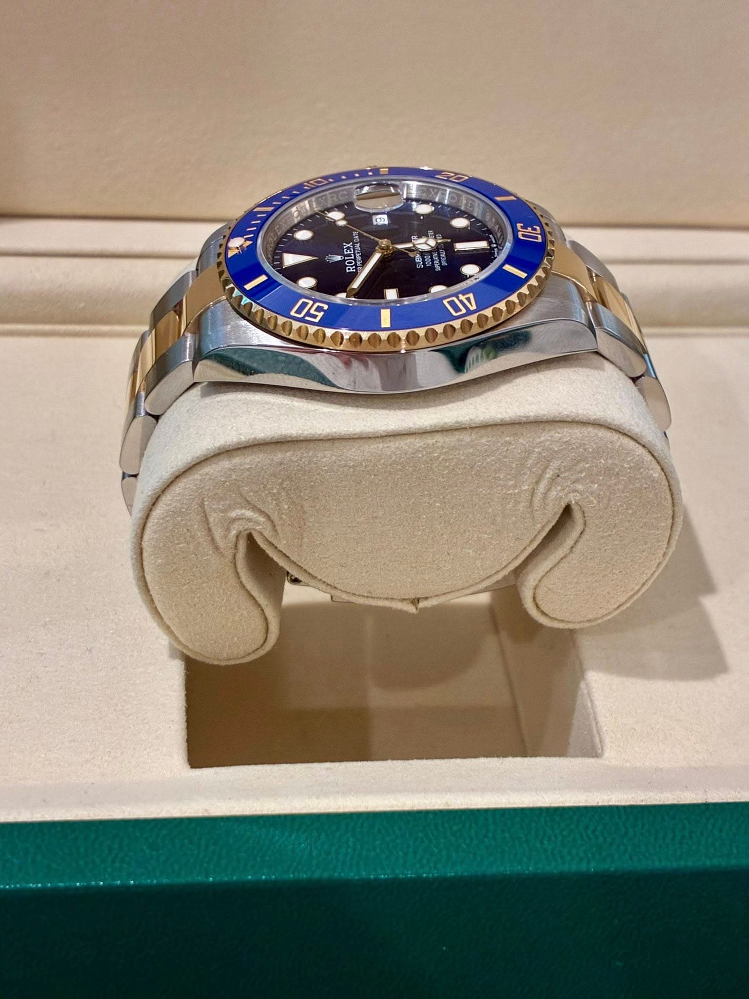 May be an image of wrist watch and text