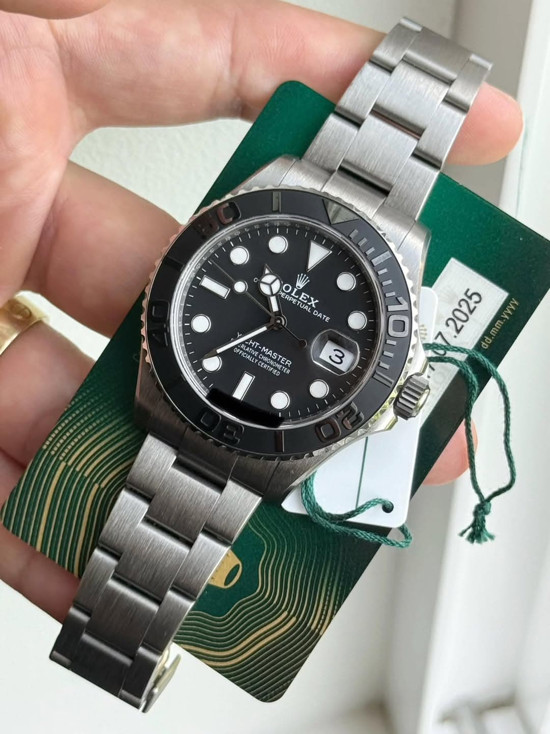 May be an image of wrist watch and text