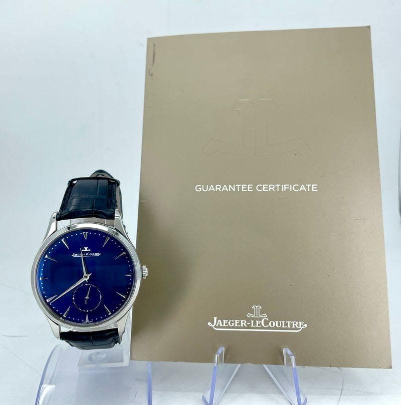 May be an image of digital watch and text that says 'GUARANTEECERTIFICATE GUARANTEE CERTIFICATE JL Jarea Ceeroy 自 LL JAEGER-LECOULTRE COULTRE LAEGER-LE'