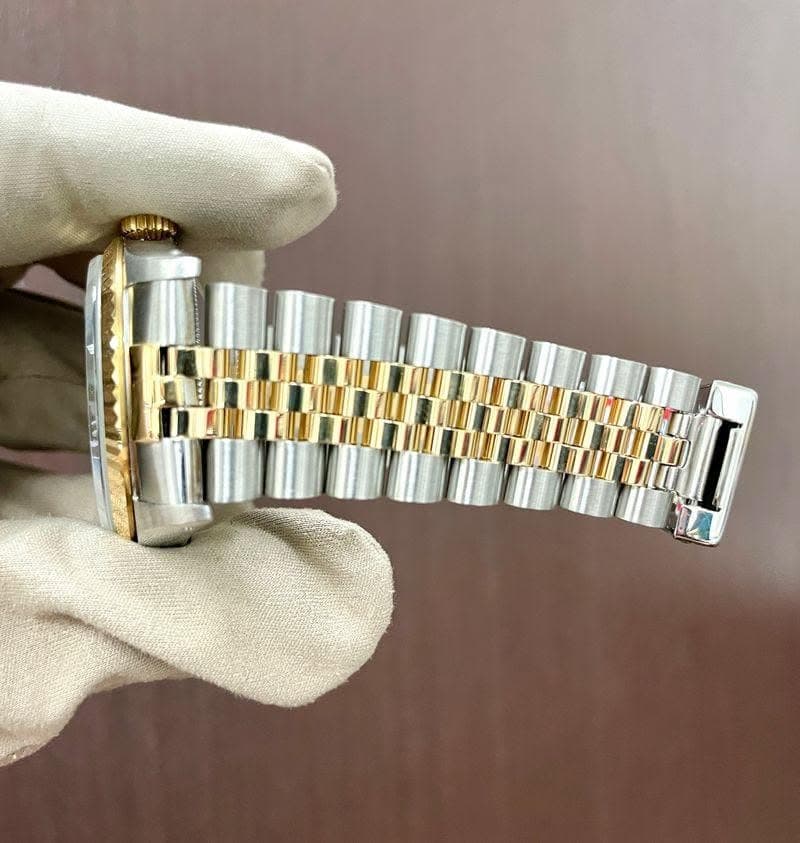 May be an image of wrist watch