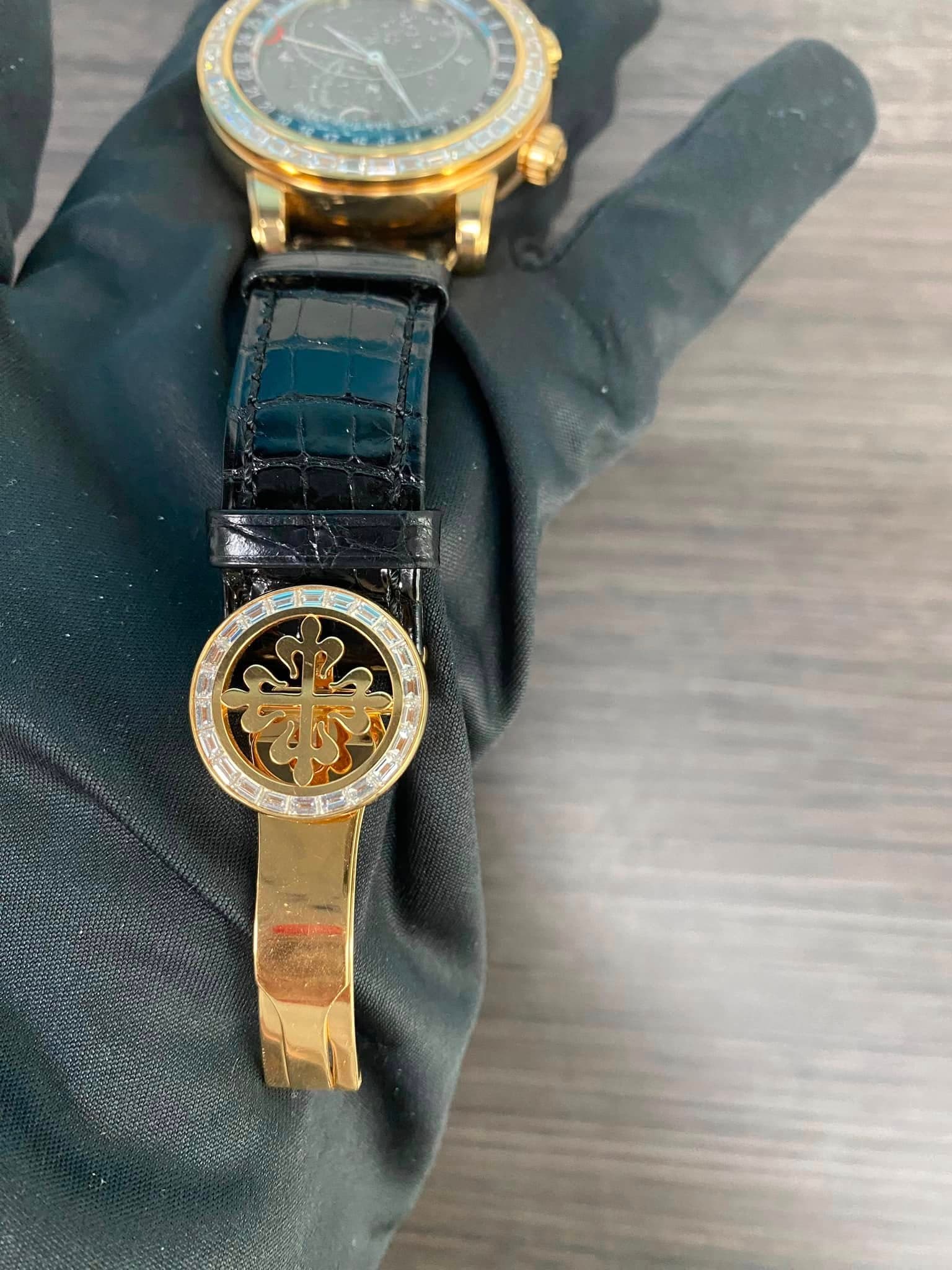 May be an image of wrist watch and text